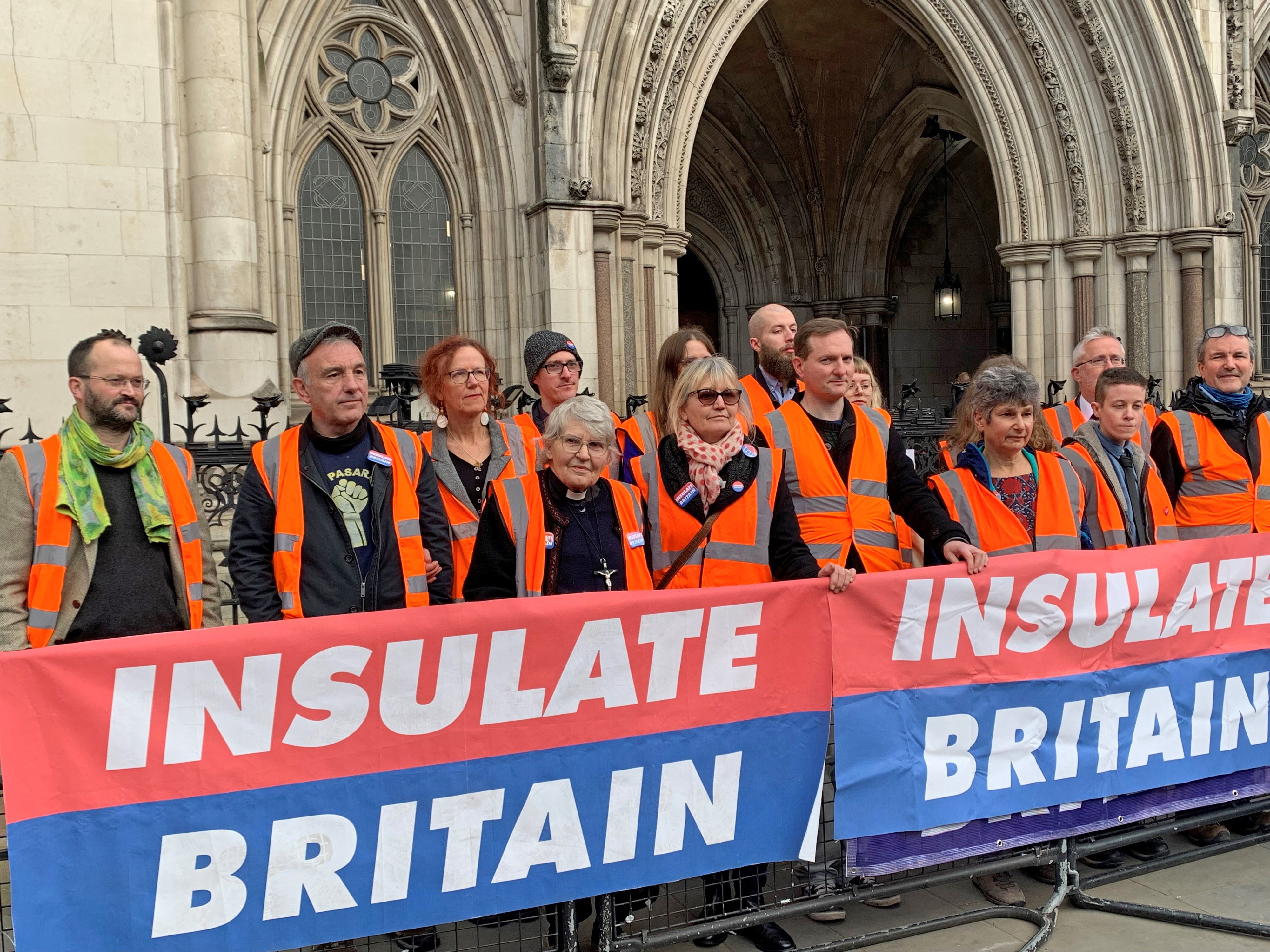 Insulate Britain protesters outside the Royal Courts of Justice in London (Tom Pilgrim/PA)