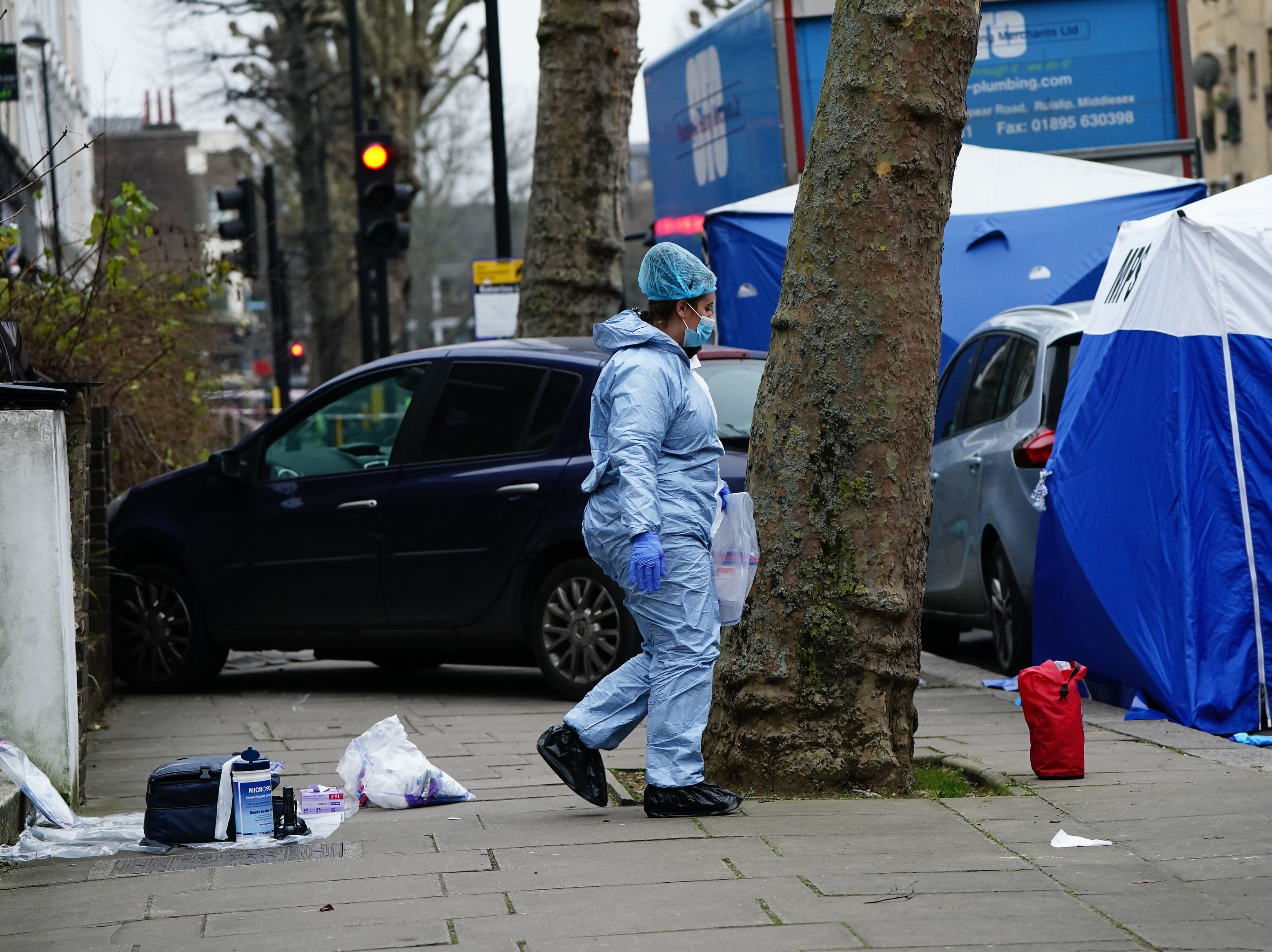 Police have said a driver who ran over a knifeman in a bid to stop him killing his ex-wife acted ‘entirely reasonably'