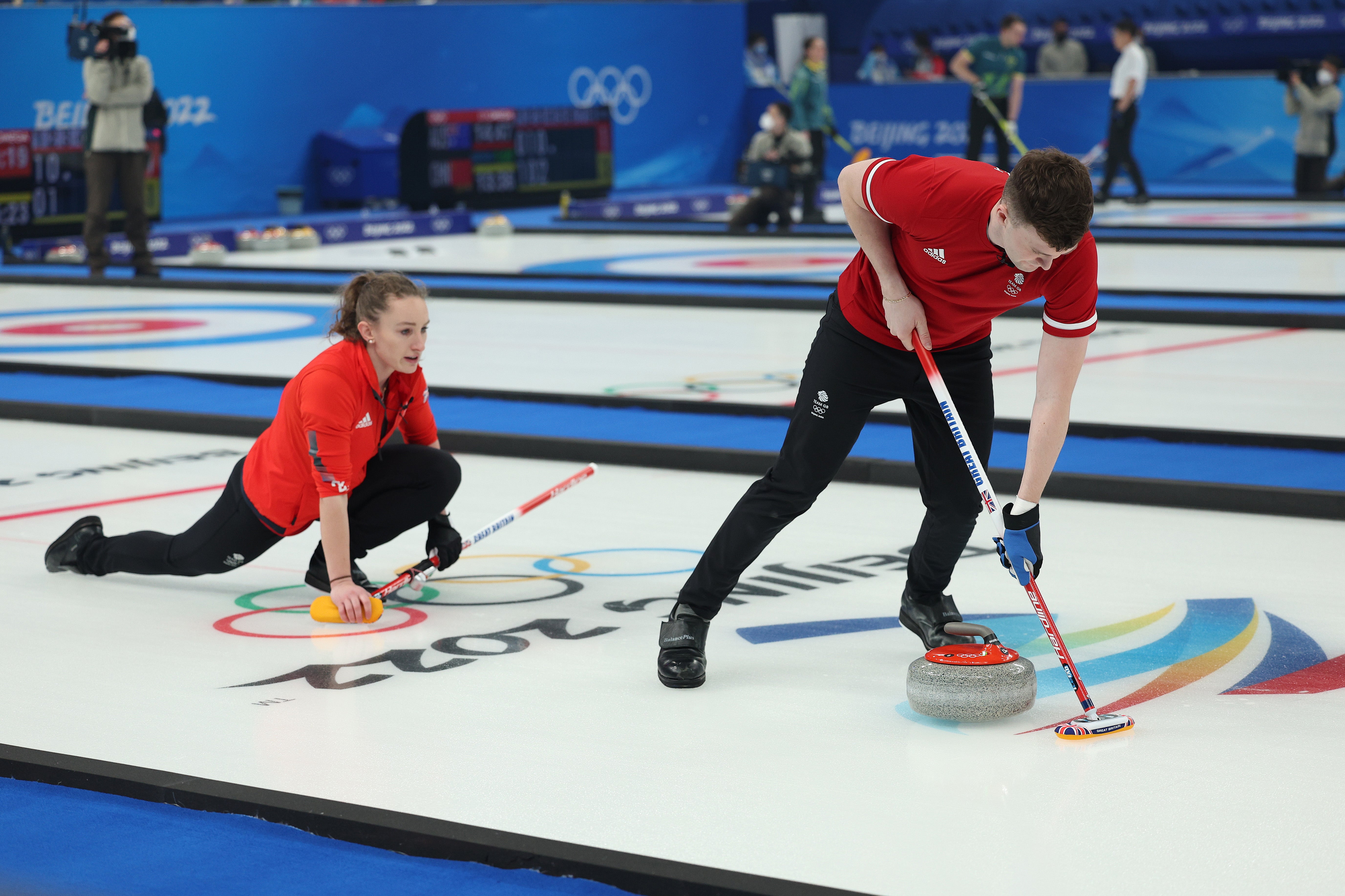 Bruce Mouat and Jennifer Dodds of Team Great Britain compete against Team Canada