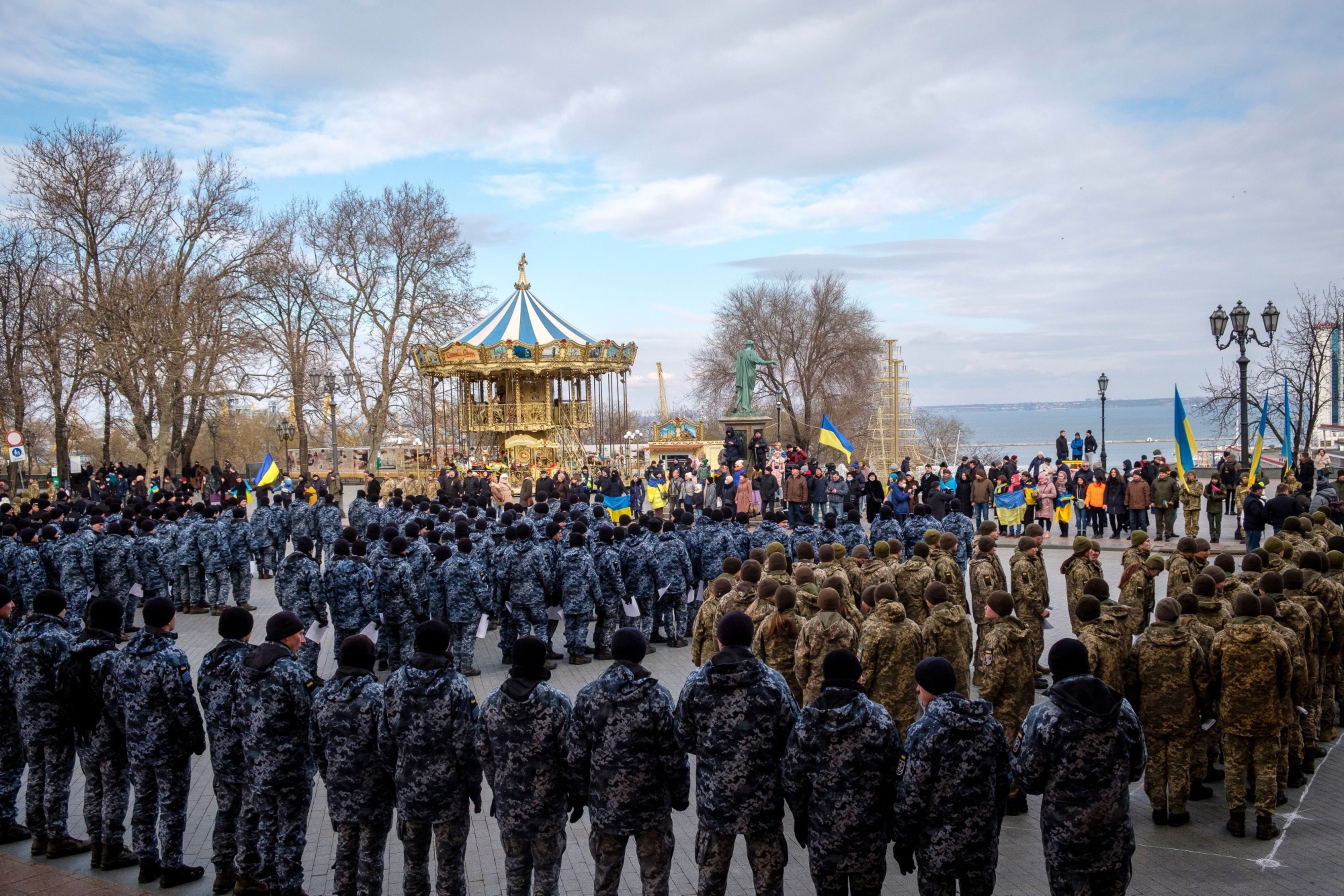 Police officers and Ukrainian soldiers attend a rally in Odessa last month