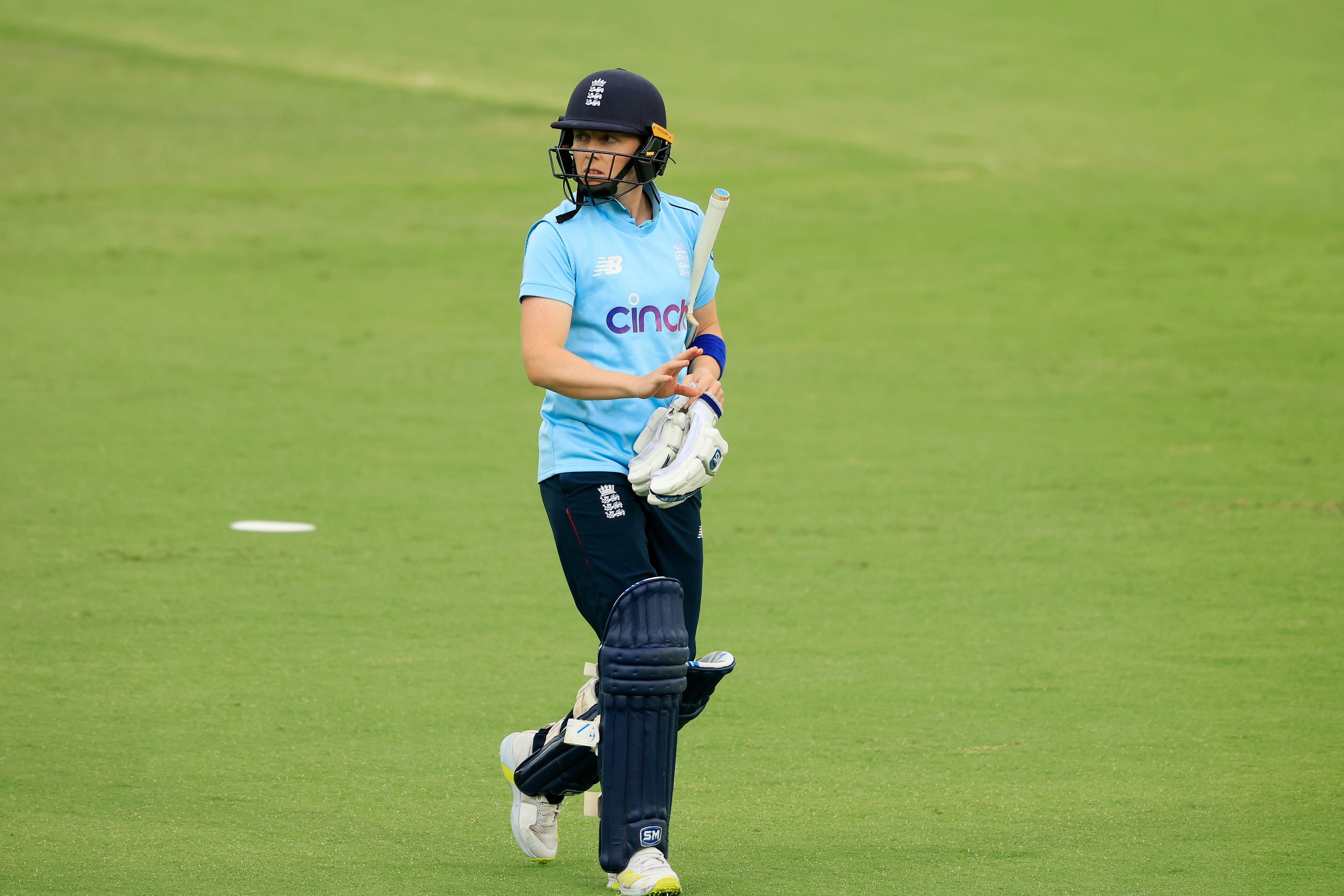 Heather Knight walks off after she was lbw off the bowling of Darcie Brown