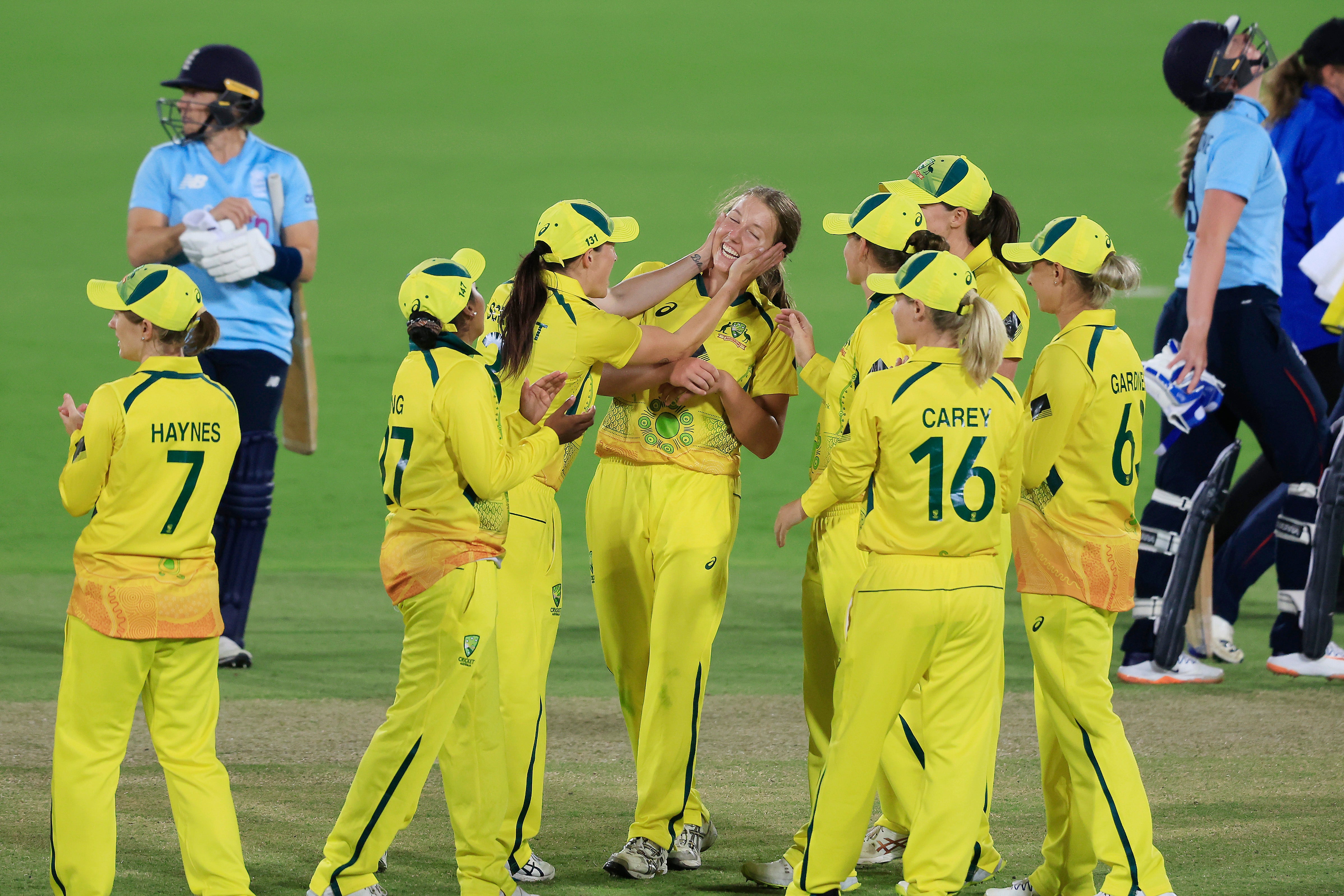 Darcie Brown of Australia celebrates the wicket of Sophie Ecclestone of England with team mates