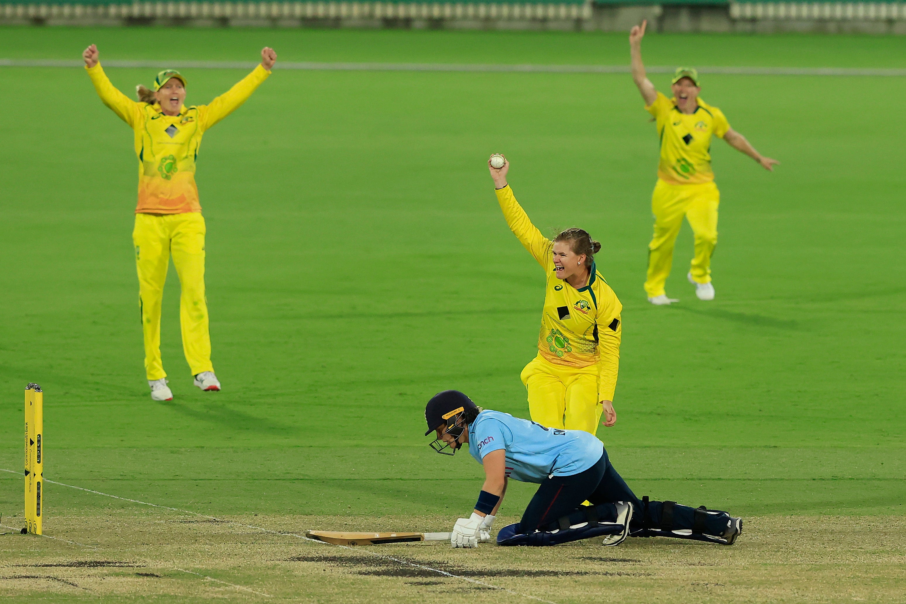 Jess Jonassen celebrates catching Kate Cross off her own bowling