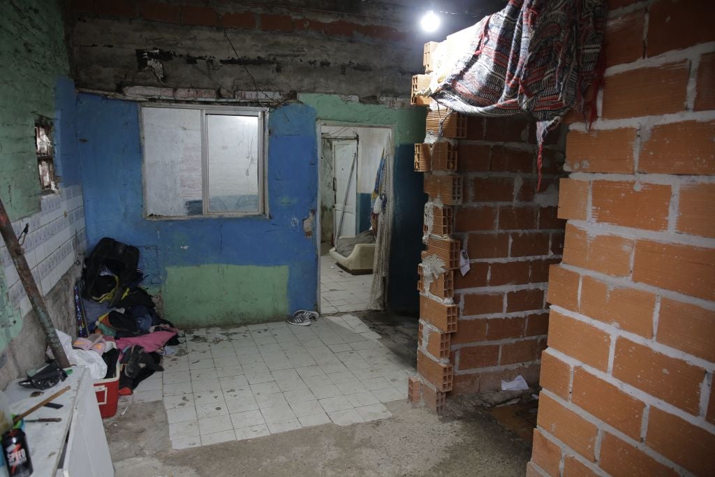 View of the house police raided looking for adulterated cocaine in Puerta 8 shantytown, Buenos Aires province, on 2 February. At least 20 people have died and 74 more were hospitalised in Buenos Aires after consuming the cocaine cut with a toxic substance.