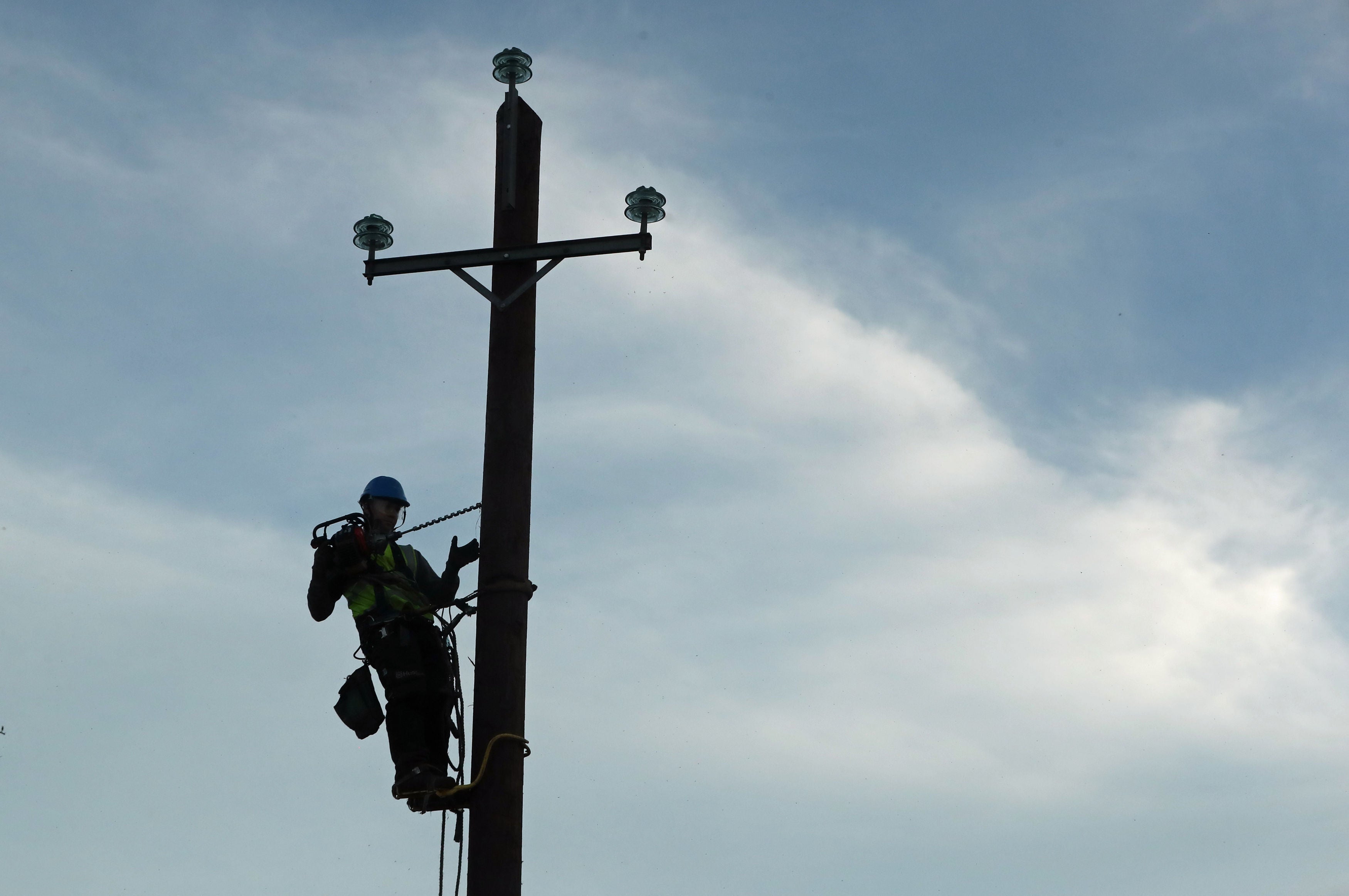 Engineers work to restore power to homes without electricity (Niall Carson/PA)