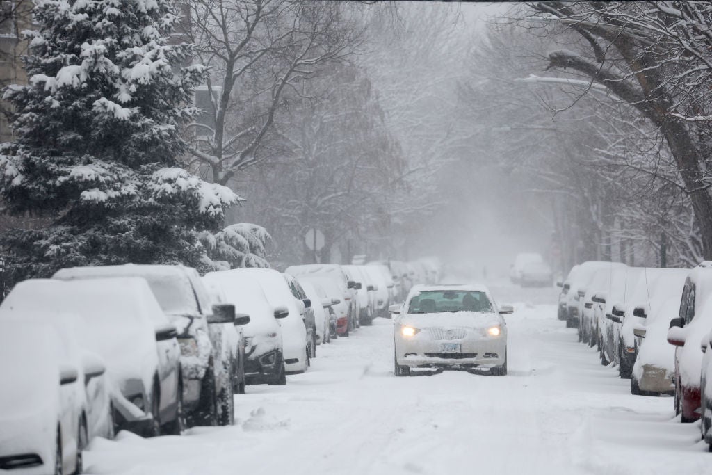 A pile-up involving more than 100 vehicles closed a portion of an interstate highway in Illinois on Thursday amid a snowstorm