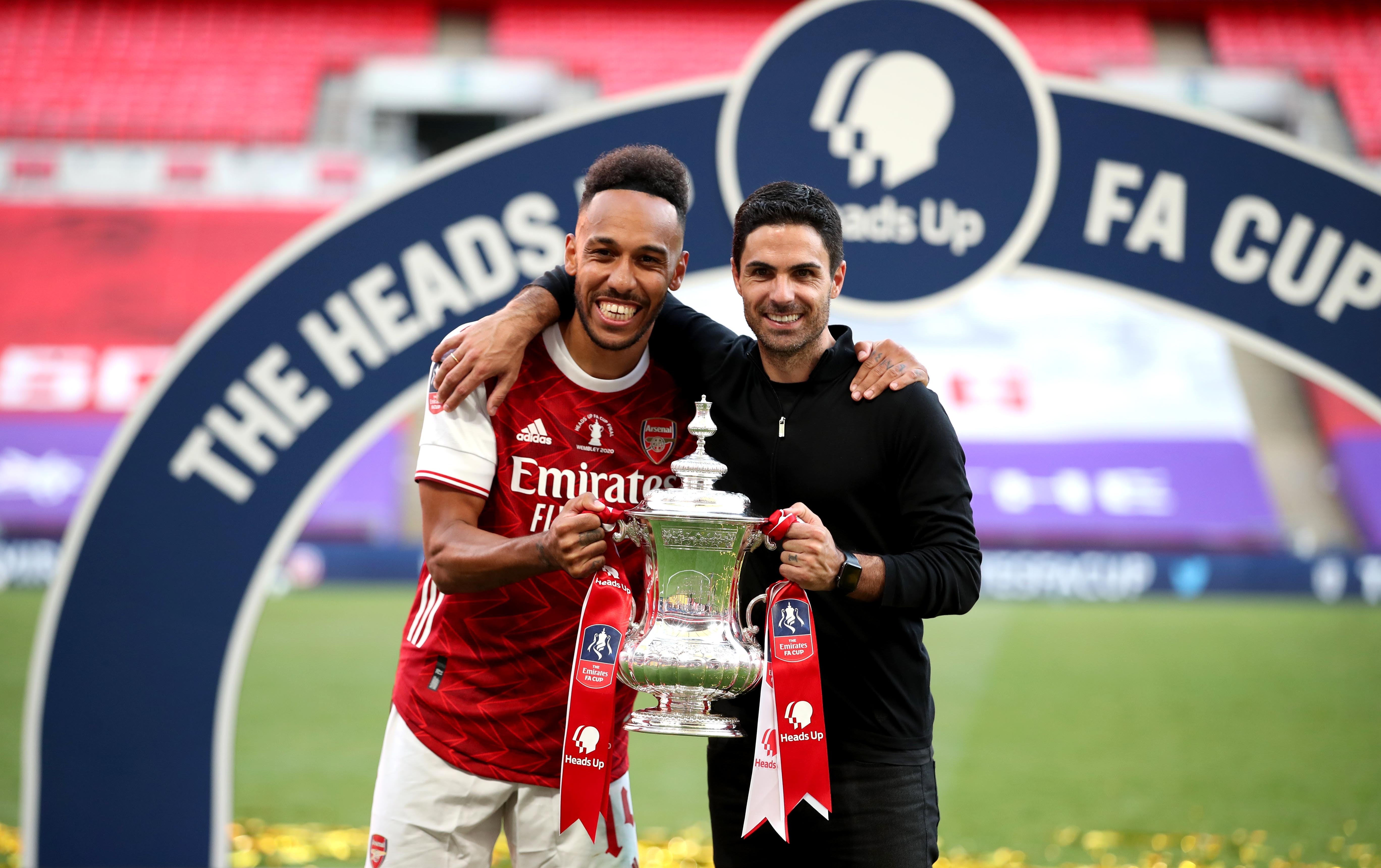 Arsenal manager Mikel Arteta (right) and Pierre-Emerick Aubameyang celebrated winning the 2020 FA Cup (Adam Davy/PA)