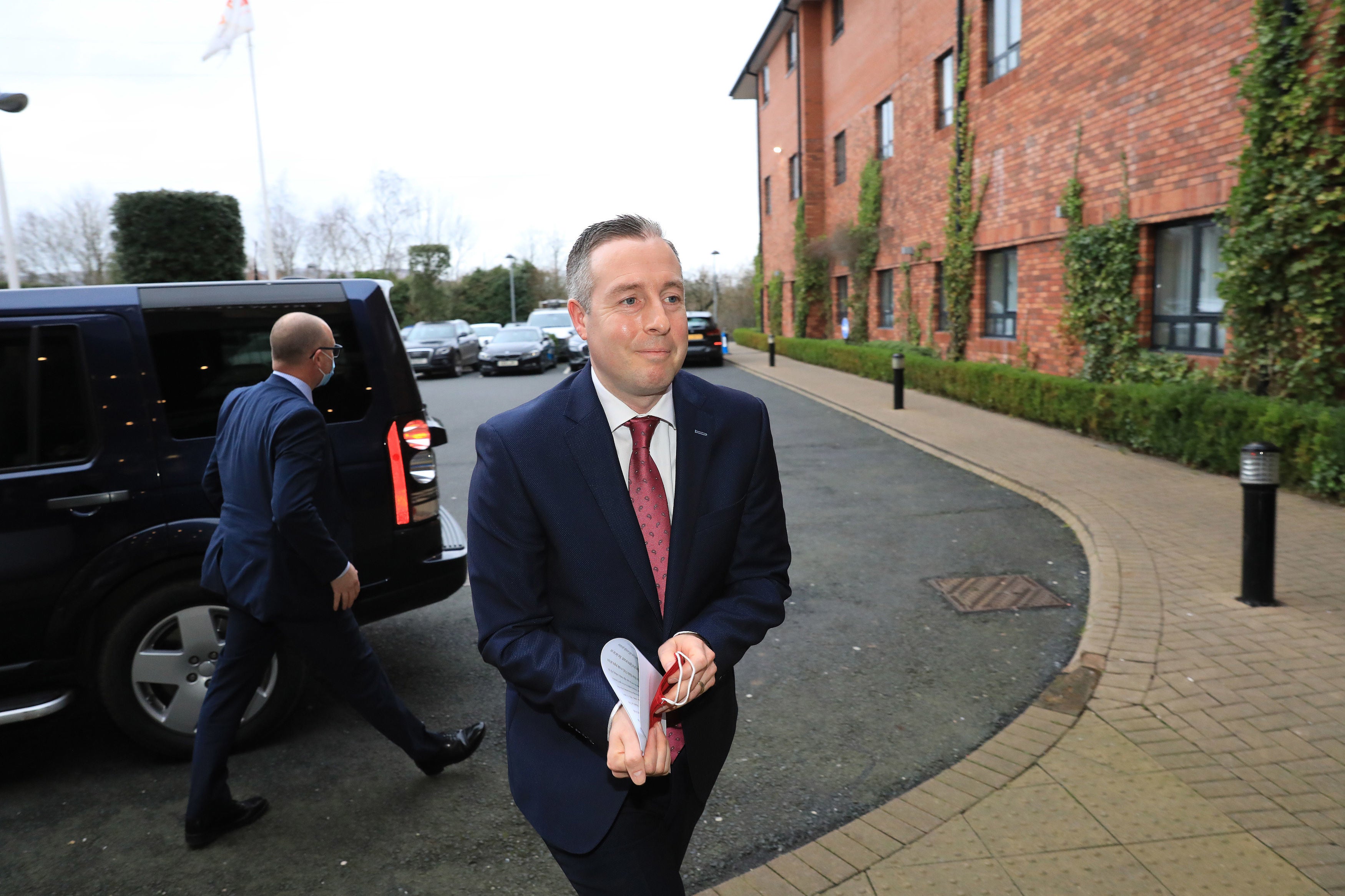 First minister of Northern Ireland Paul Givan arrives at the Crowne Plaza Hotel, Belfast, ahead of his resignation announcement