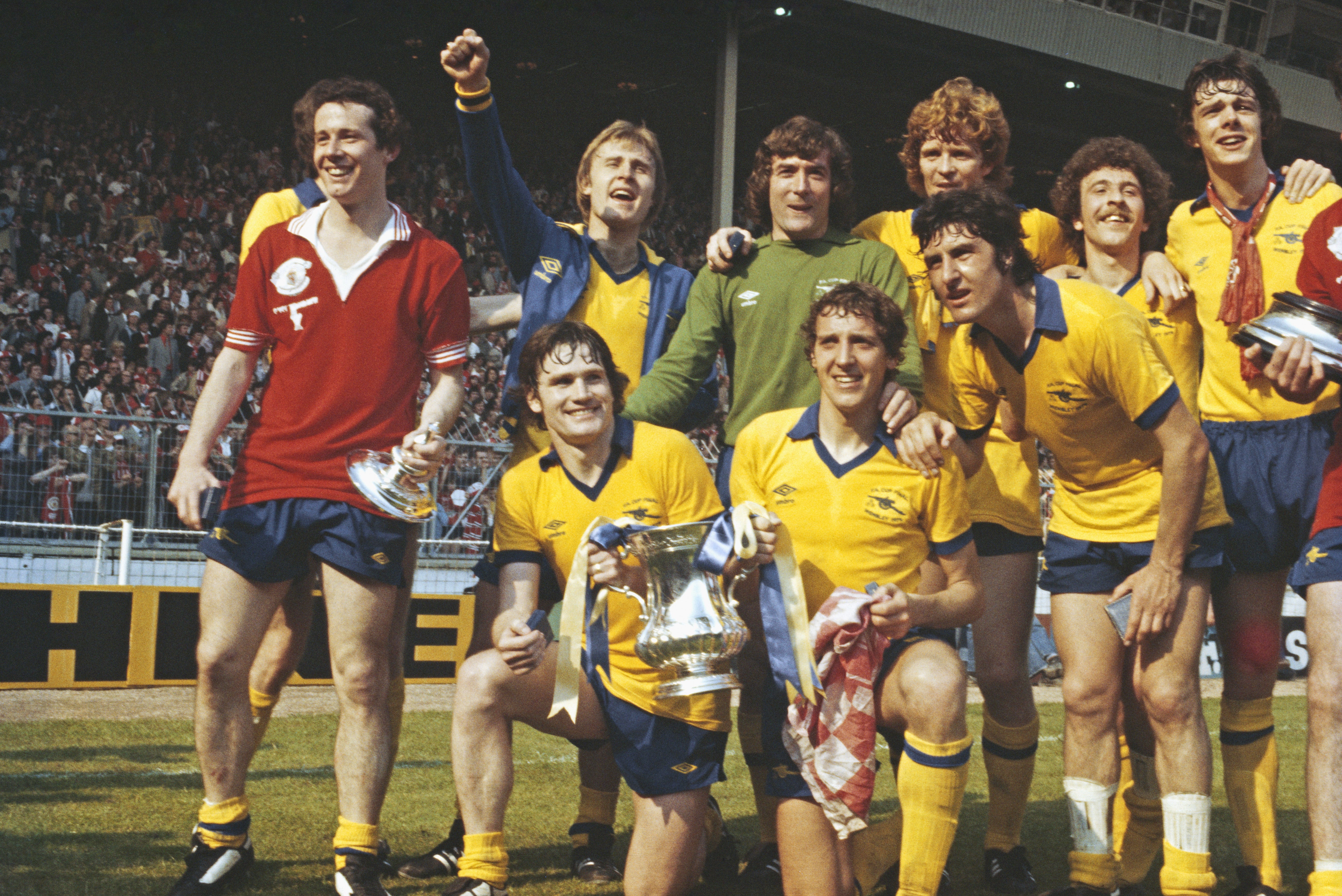 Liam Brady, left, celebrates winning the 1979 FA Cup