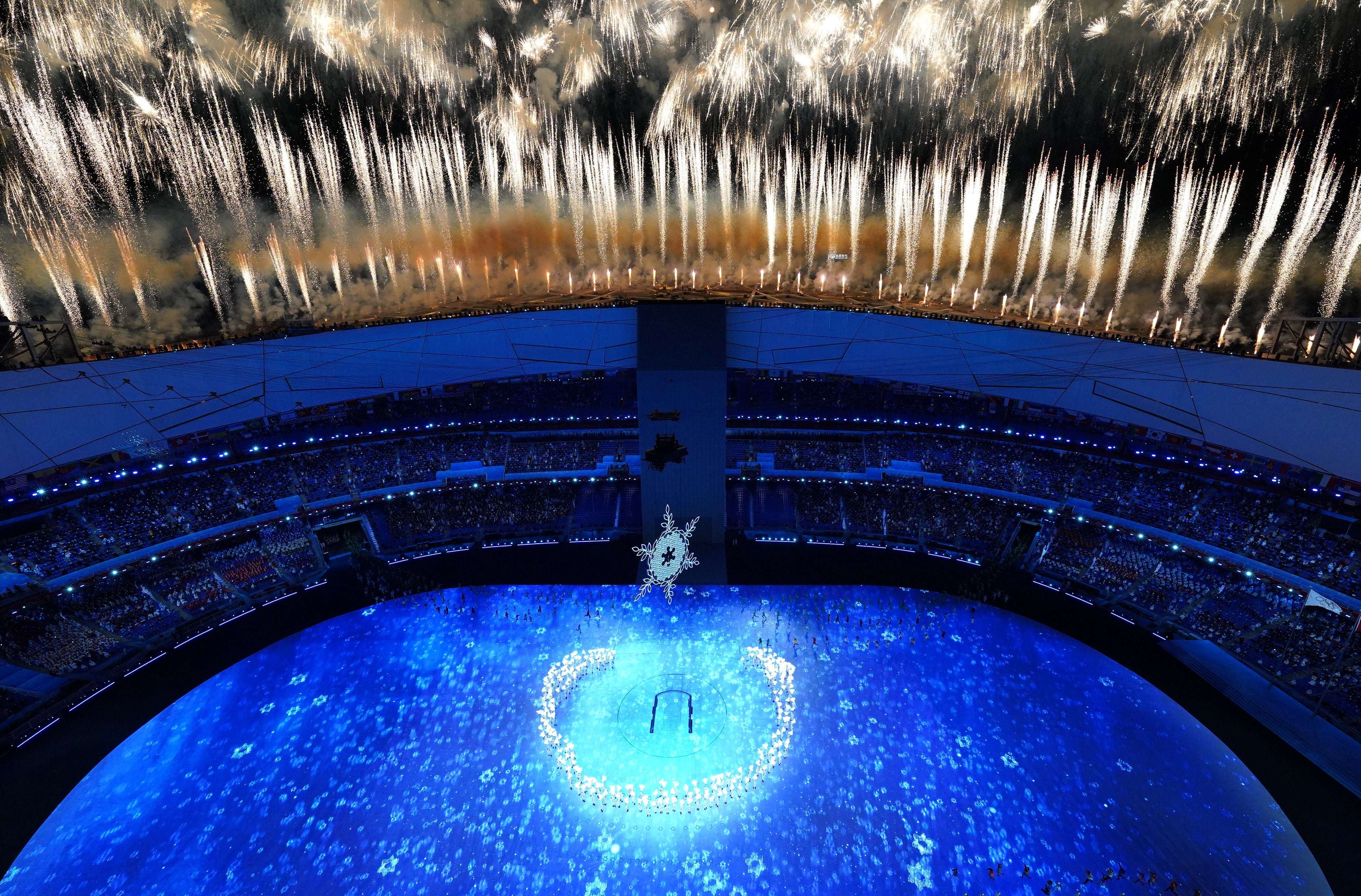 General view of the Olympic cauldron and fireworks during the opening ceremony. REUTERS/Pawel Kopczynski