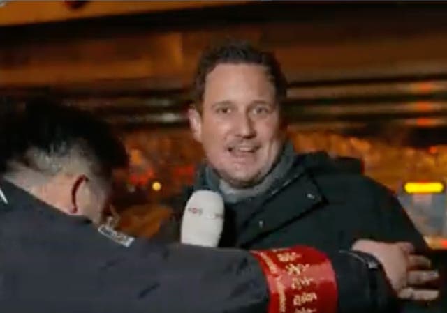 <p>Dutch TV reporter dragged away by Chinese official during live broadcast</p>