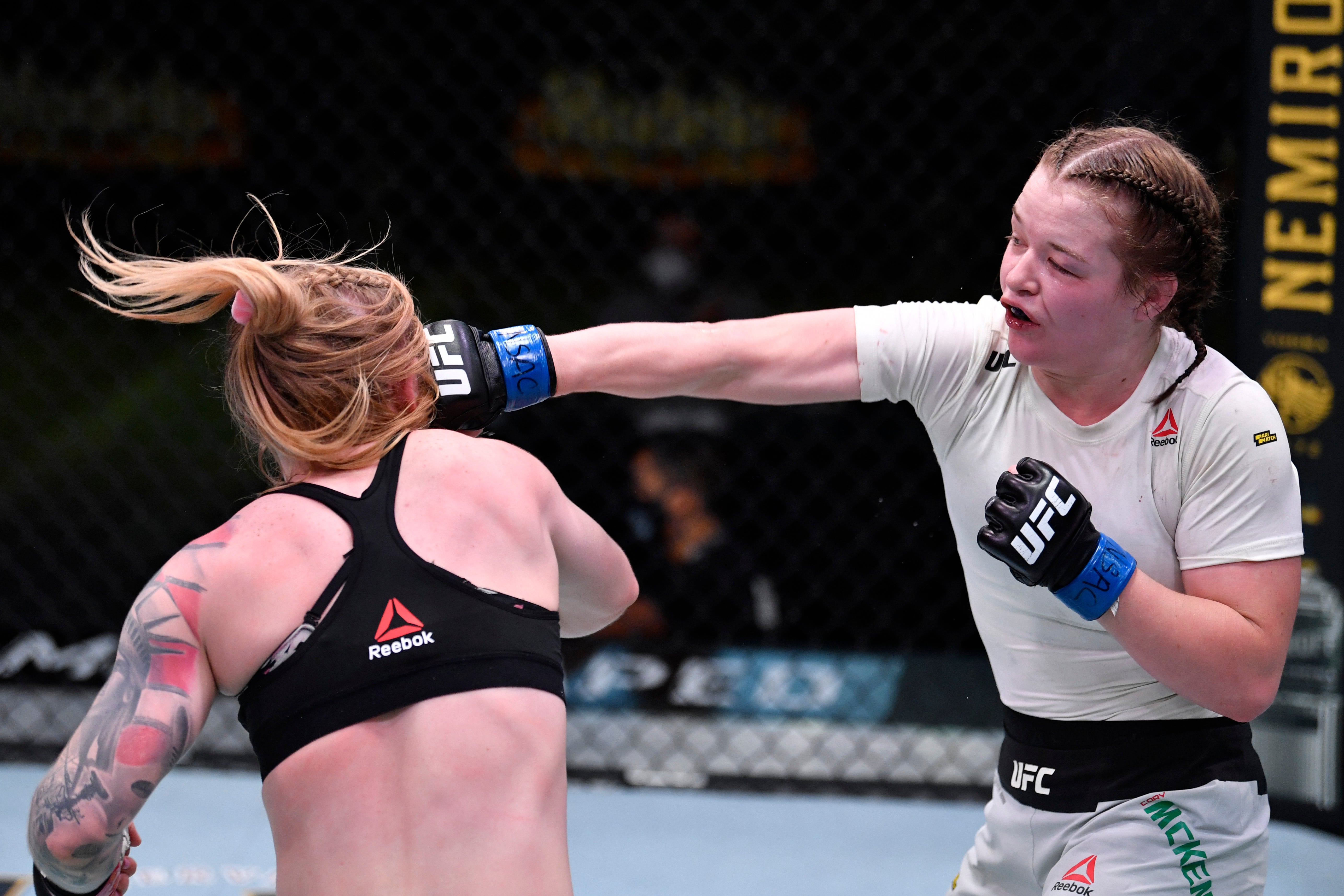 McKenna (right) in her UFC debut, a win against Kay Hansen