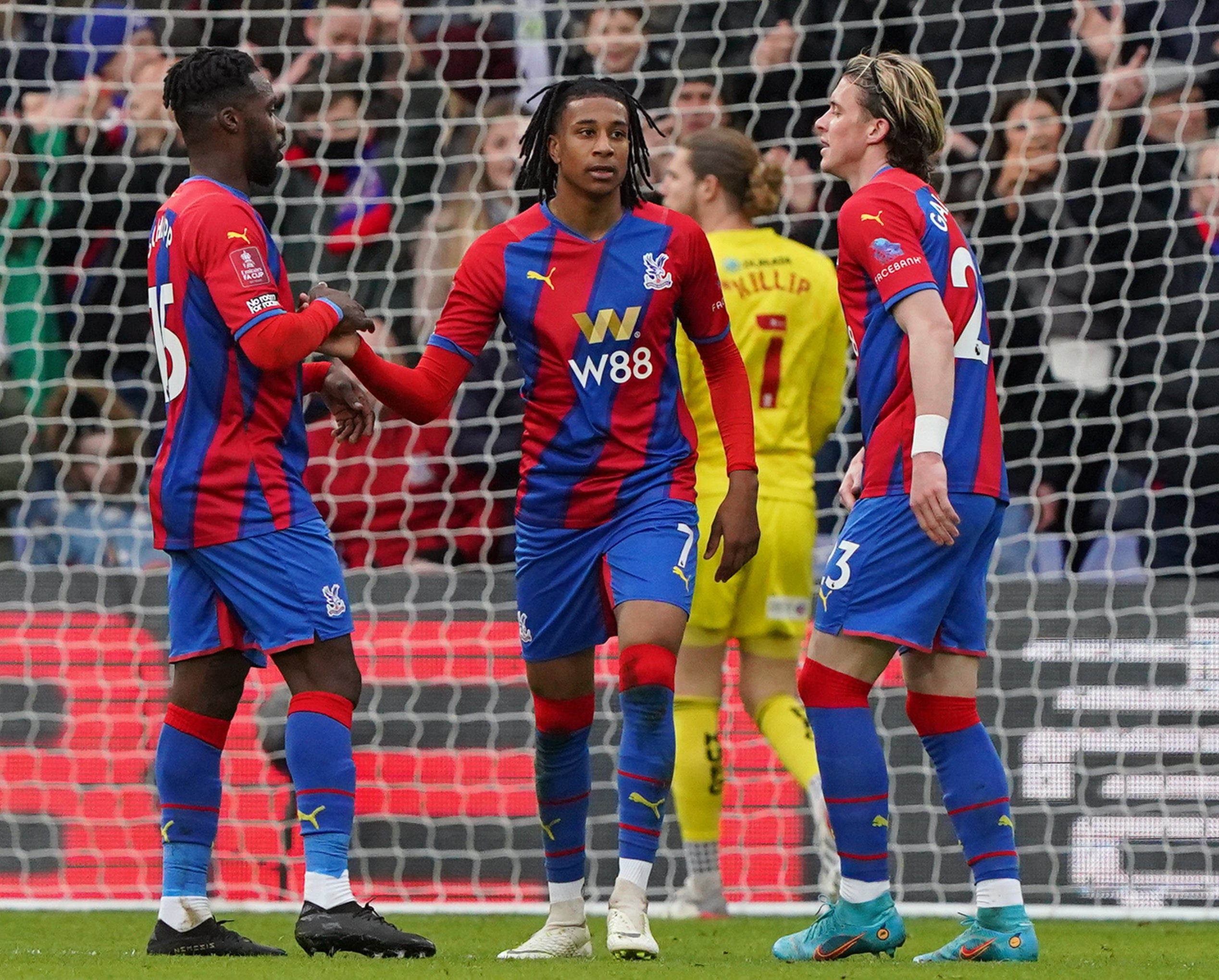 Michael Olise celebrates after putting Crystal Palace two up against Hartlepool (Jonathan Brady/PA)