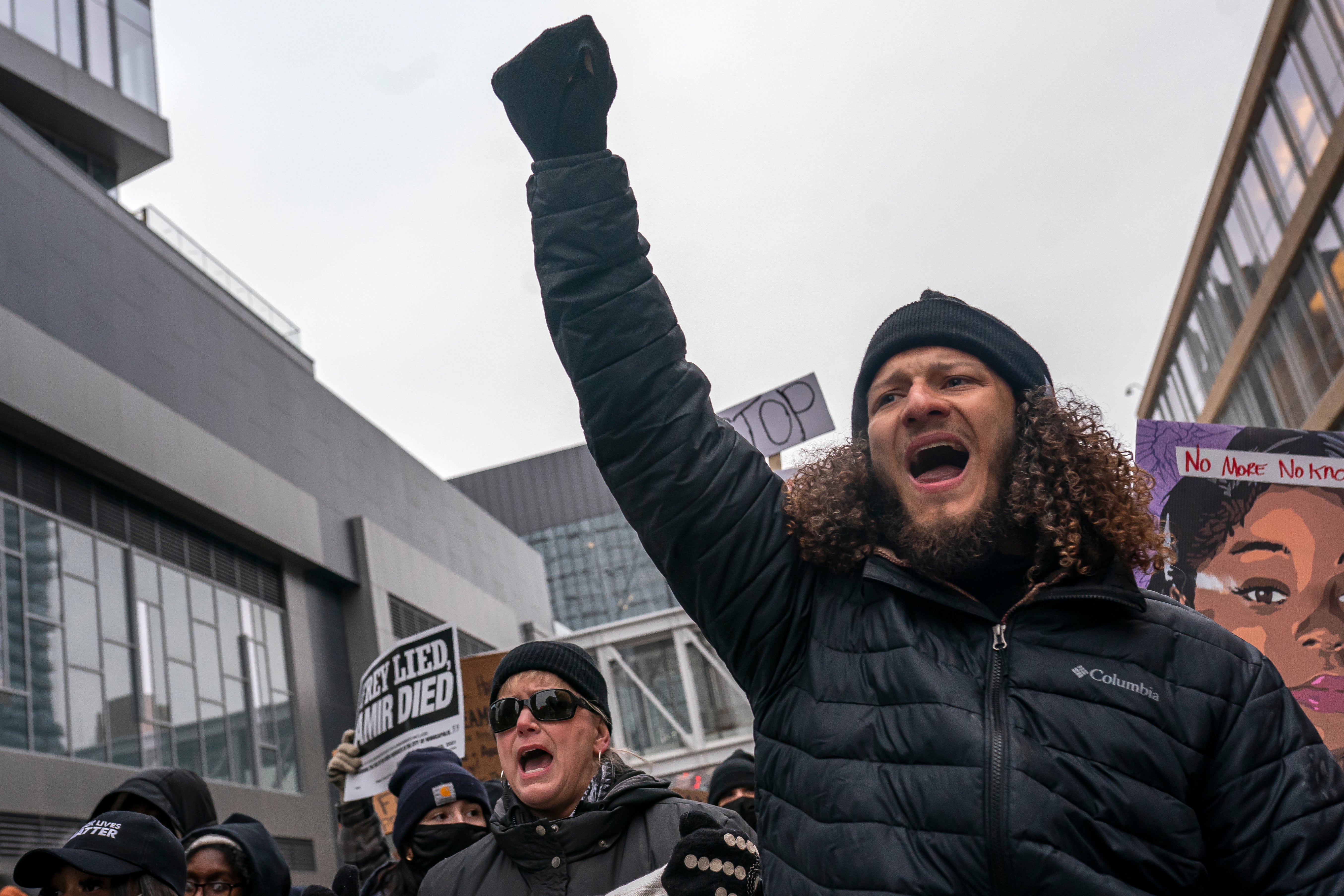 Lavish Mack chants during a racial justice march for Amir Locke on February 5, 2022 in Minneapolis, Minnesota