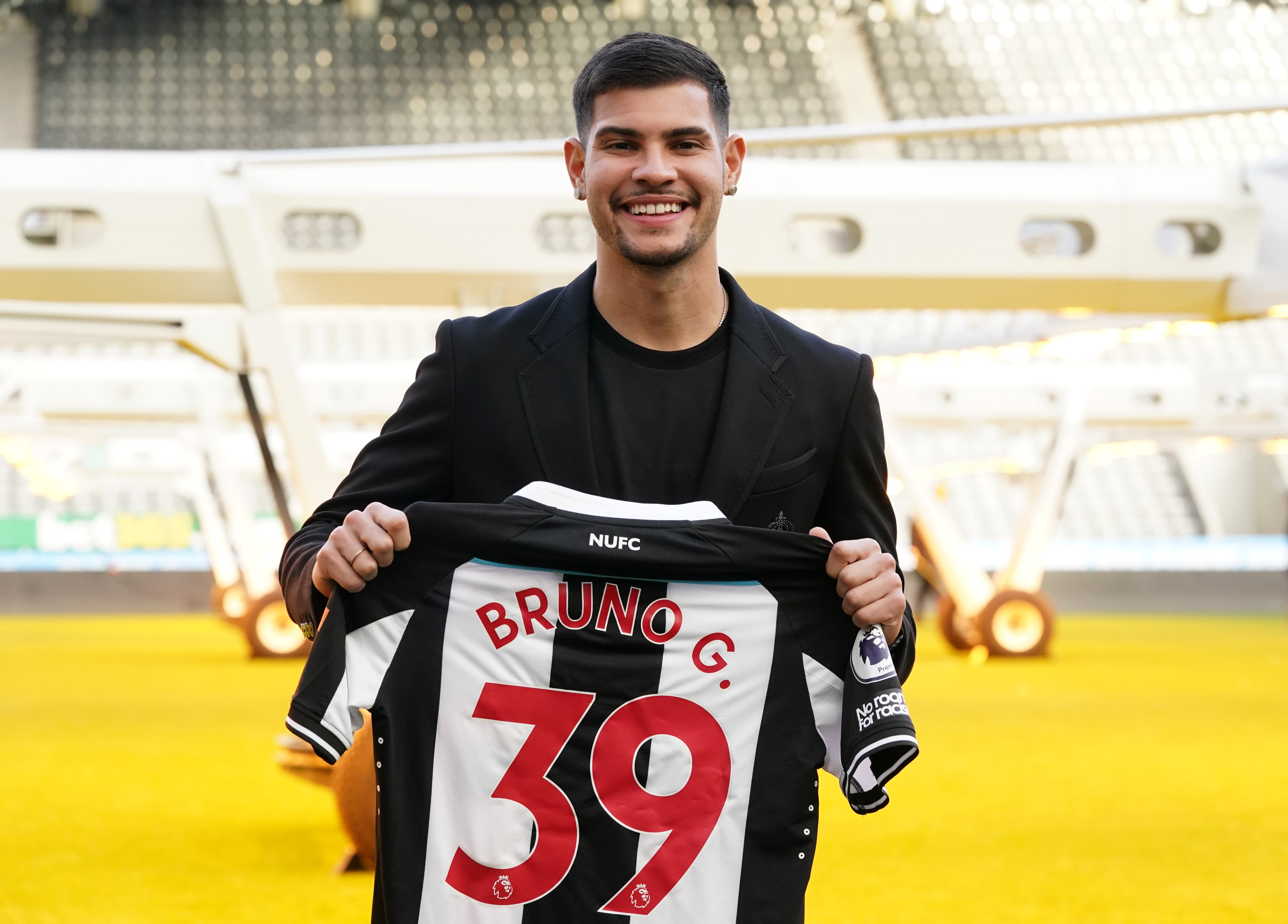 Guimaraes will wear 39 on the back of his shirt – the number of the taxi his father drove for 20 years (Owen Humphreys/PA)