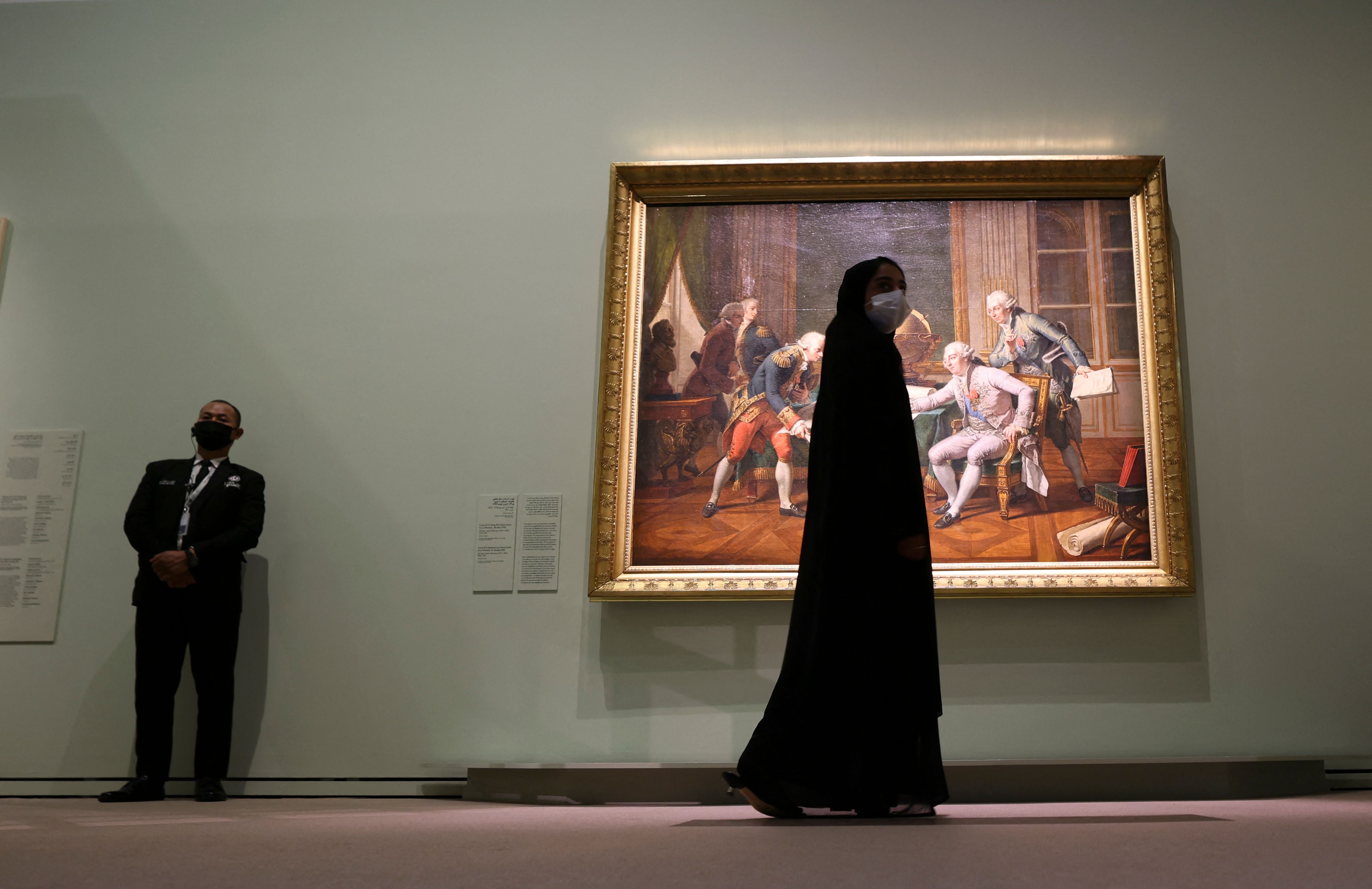 Visitors tour the exhibition “Versailles and the World” at the Louvre Abu Dhabi