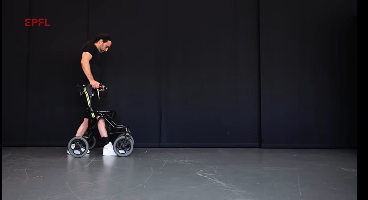 Paralysed men walk again thanks to spine implant