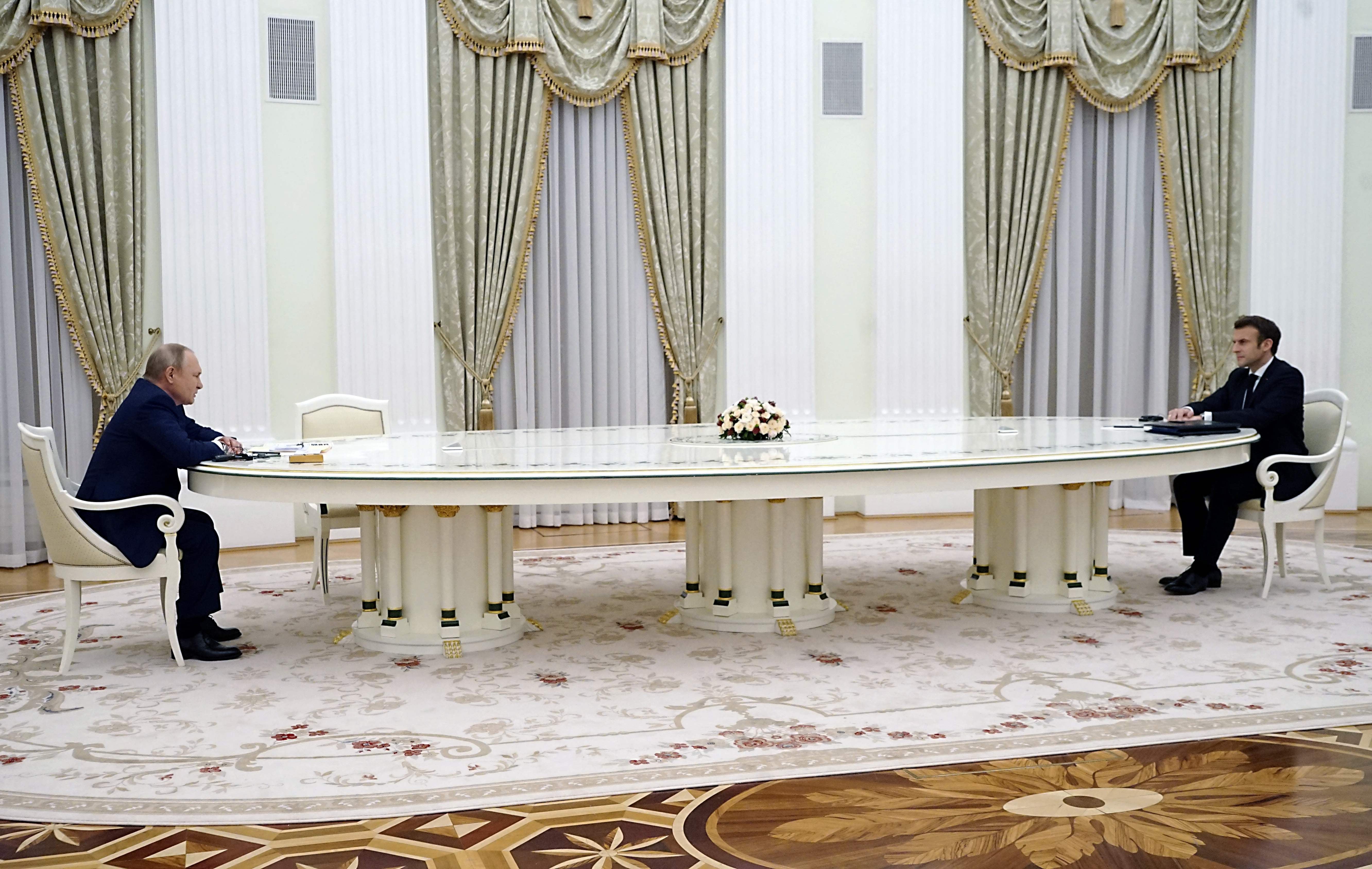 Paranoid with Covid-19 and assassination attempts, Putin often sits metres away from his guests