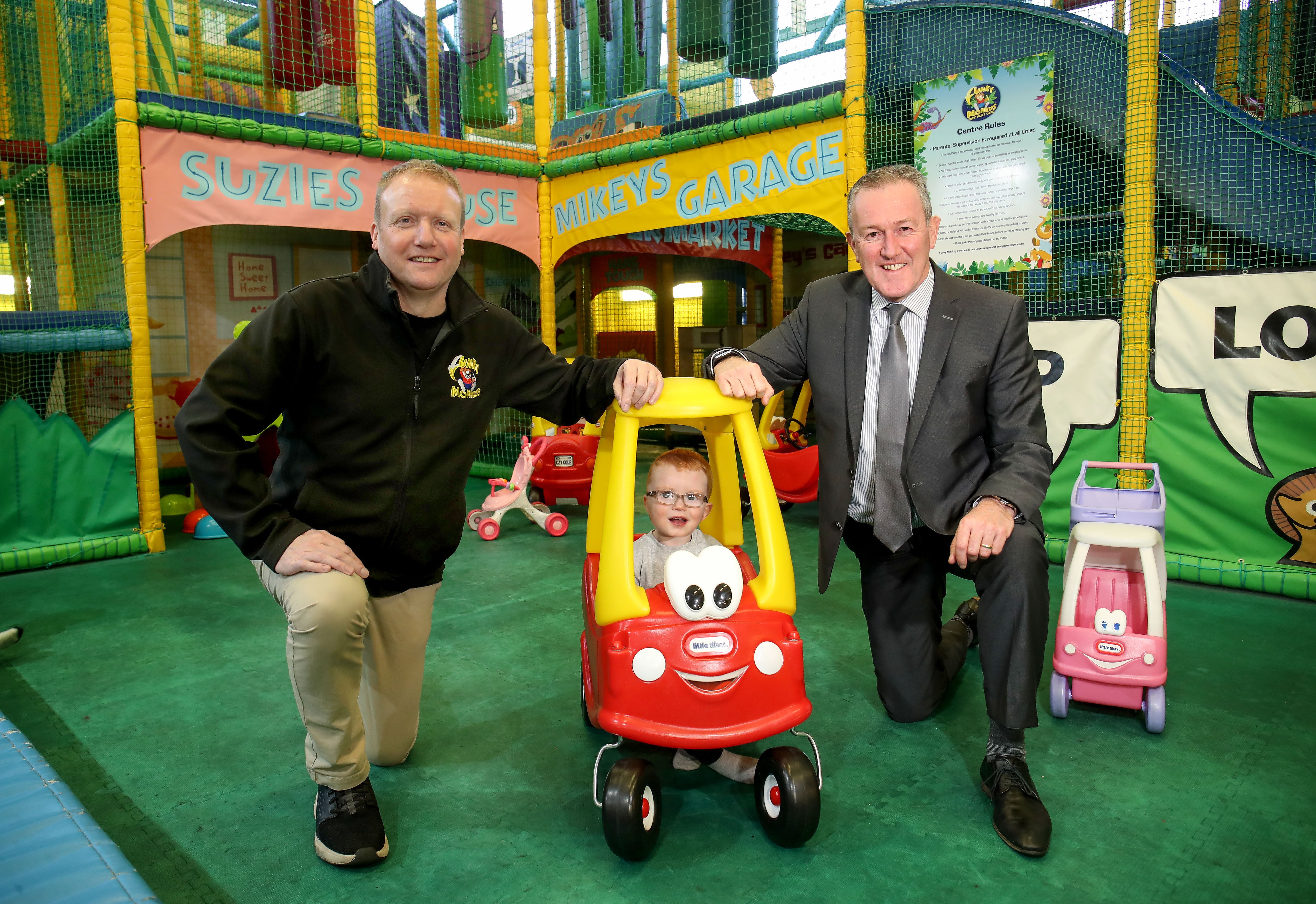 Handout photo issued by Press Eye of Finance Minister, Conor Murphy (right) with Bernard Mulholland (left) and Cian Smith during a visit to Funky Monkeys in Kennedy Centre Belfast. Children’s soft play facilities have been added to the list of businesses eligible for a Stormont-funded Covid financial support scheme for the hospitality sector. Issue date: Tuesday February 8, 2022.