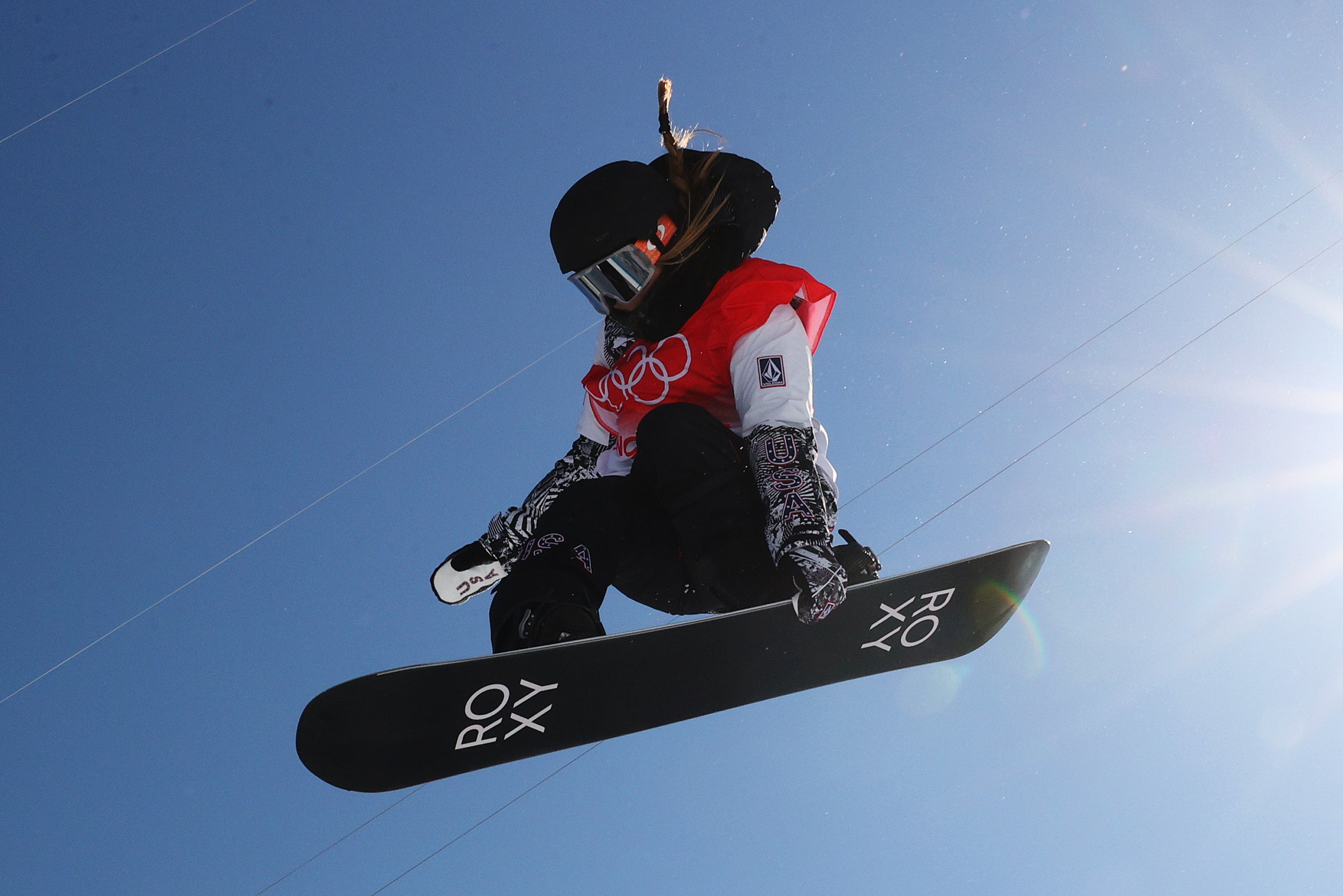 Chloe Kim of Team United States performs a trick during the Snowboard halfpipe training session