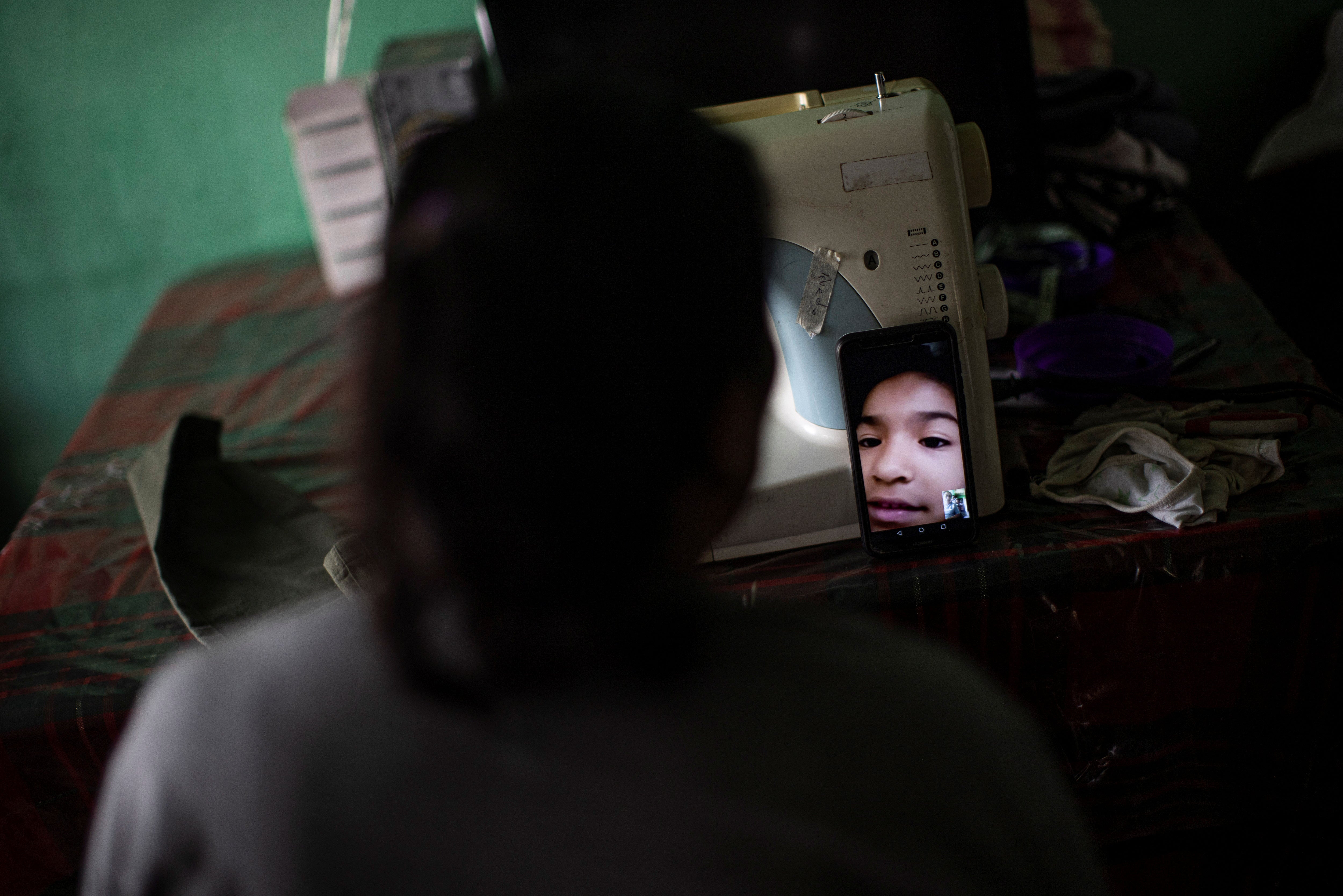 Maria on a video call with her youngest daughter, Nicole