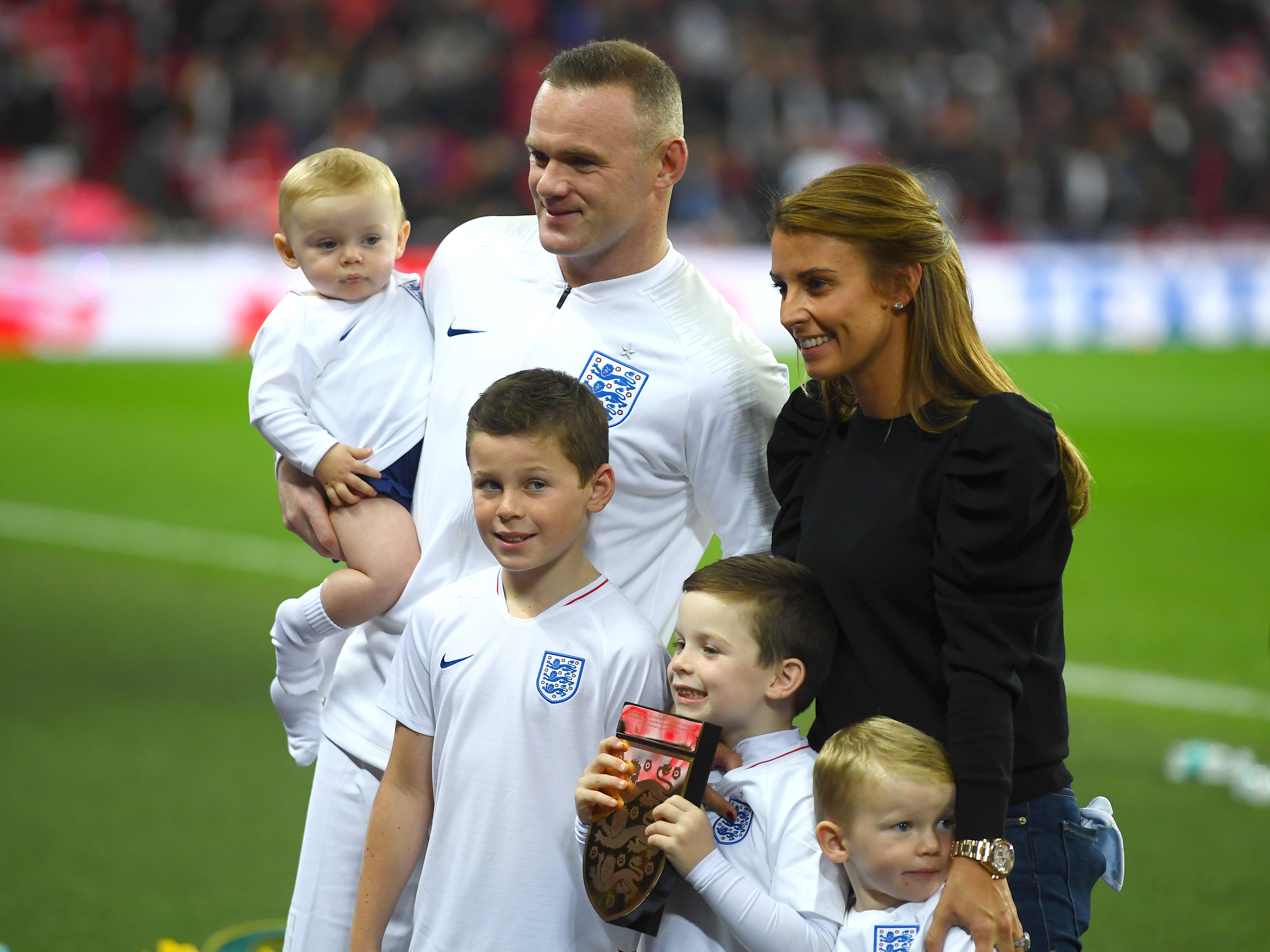 Ex-England player Wayne Rooney with his wife Coleen Rooney and their children in 2018