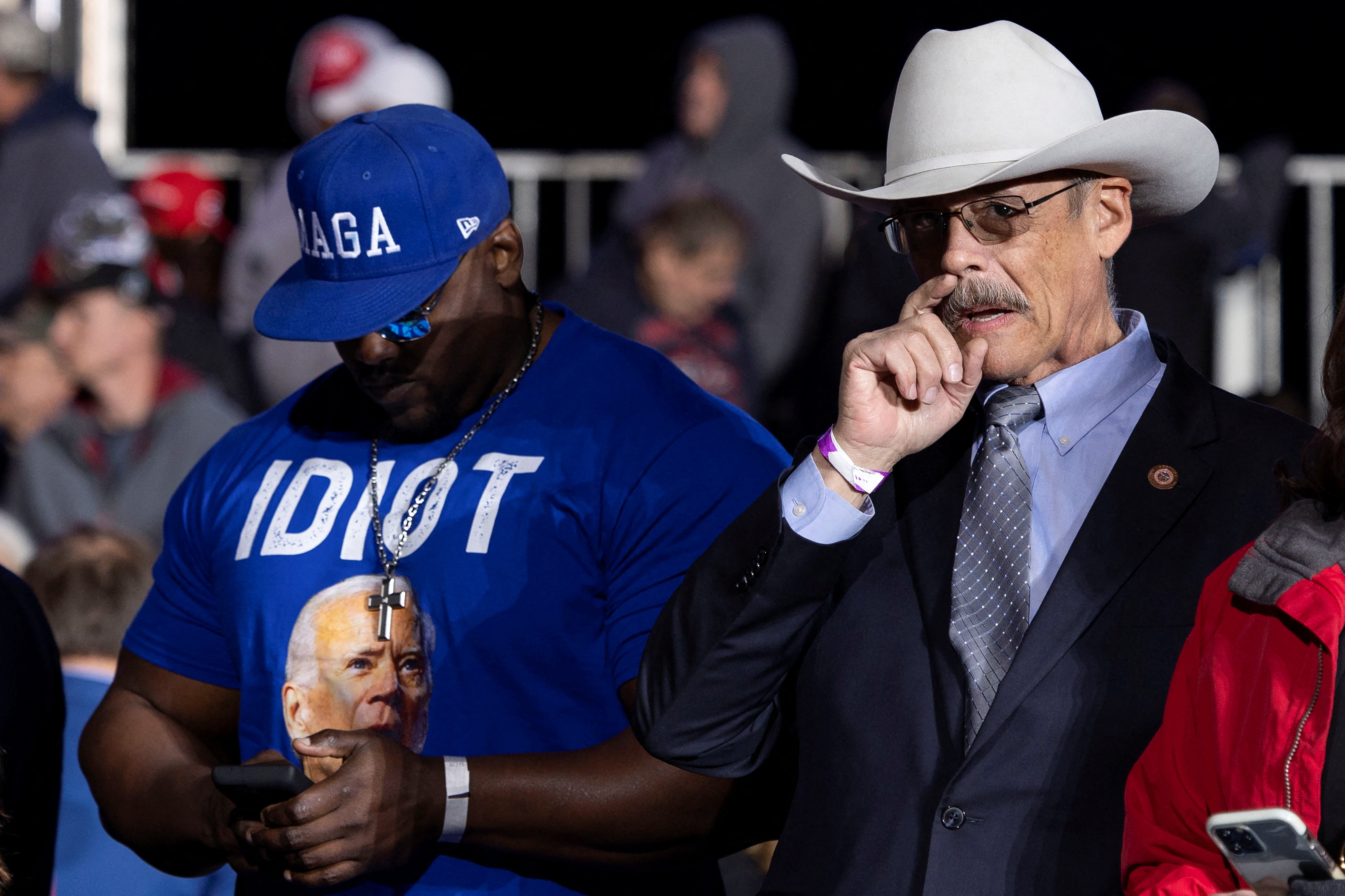 Arizona state representative and GOP secretary of state candidate Mark Finchem, right, joined Donald Trump’s rally in the state on 15 January