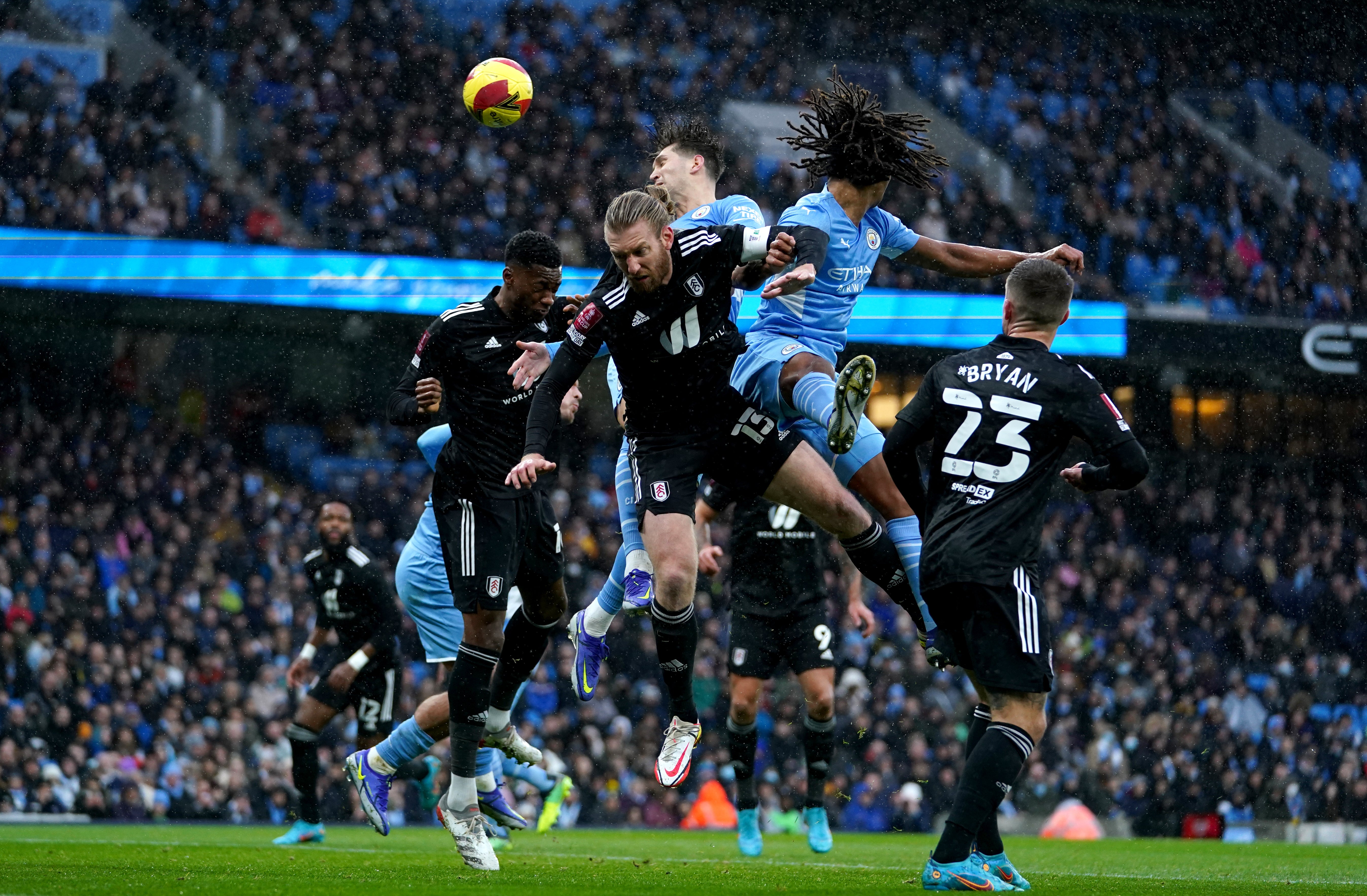 City’s John Stones (centre) scored from a corner against Fulham (Martin Rickett/PA)