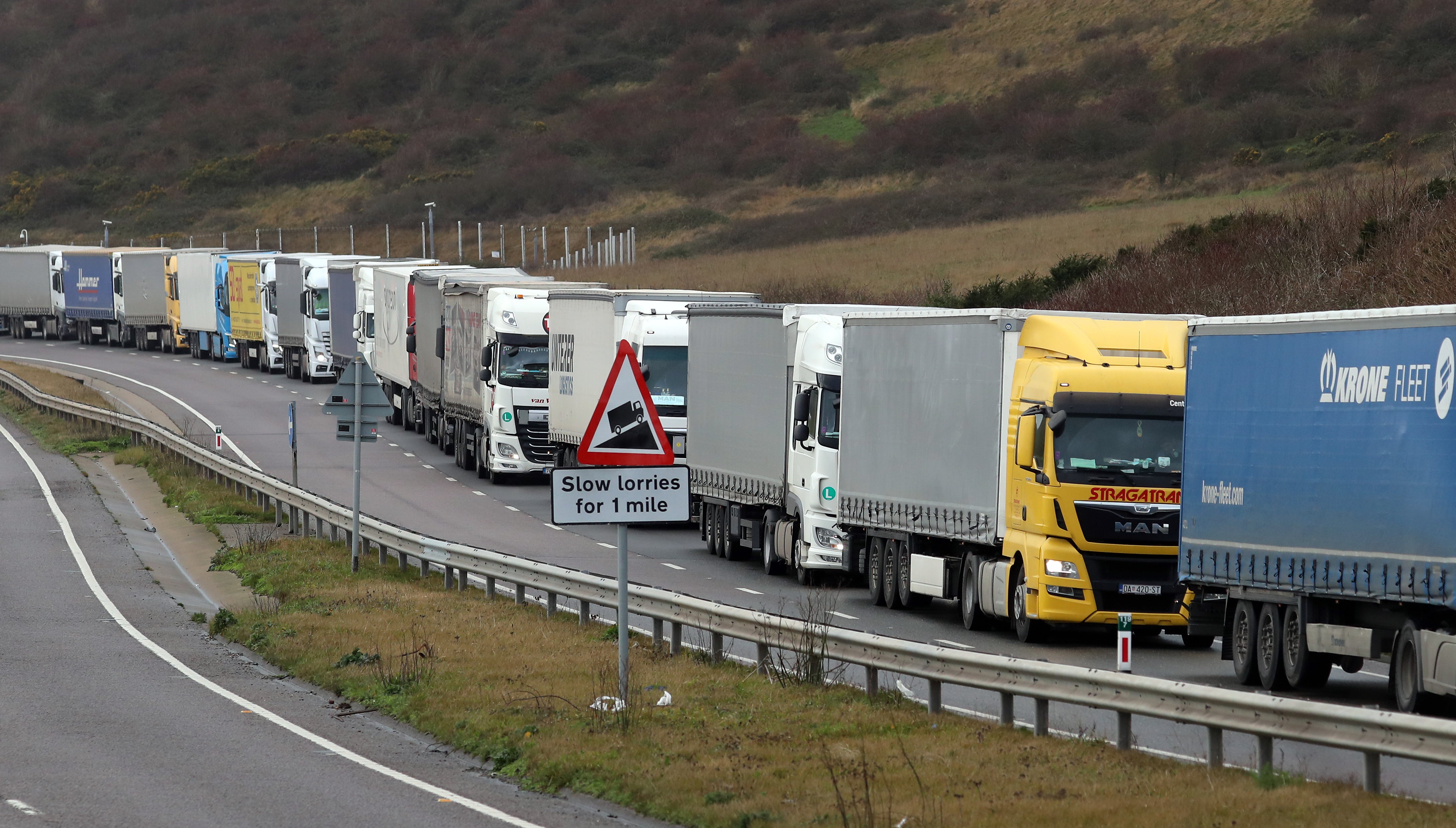 Lorries queue on the A20 to enter the port of Dover in Kent