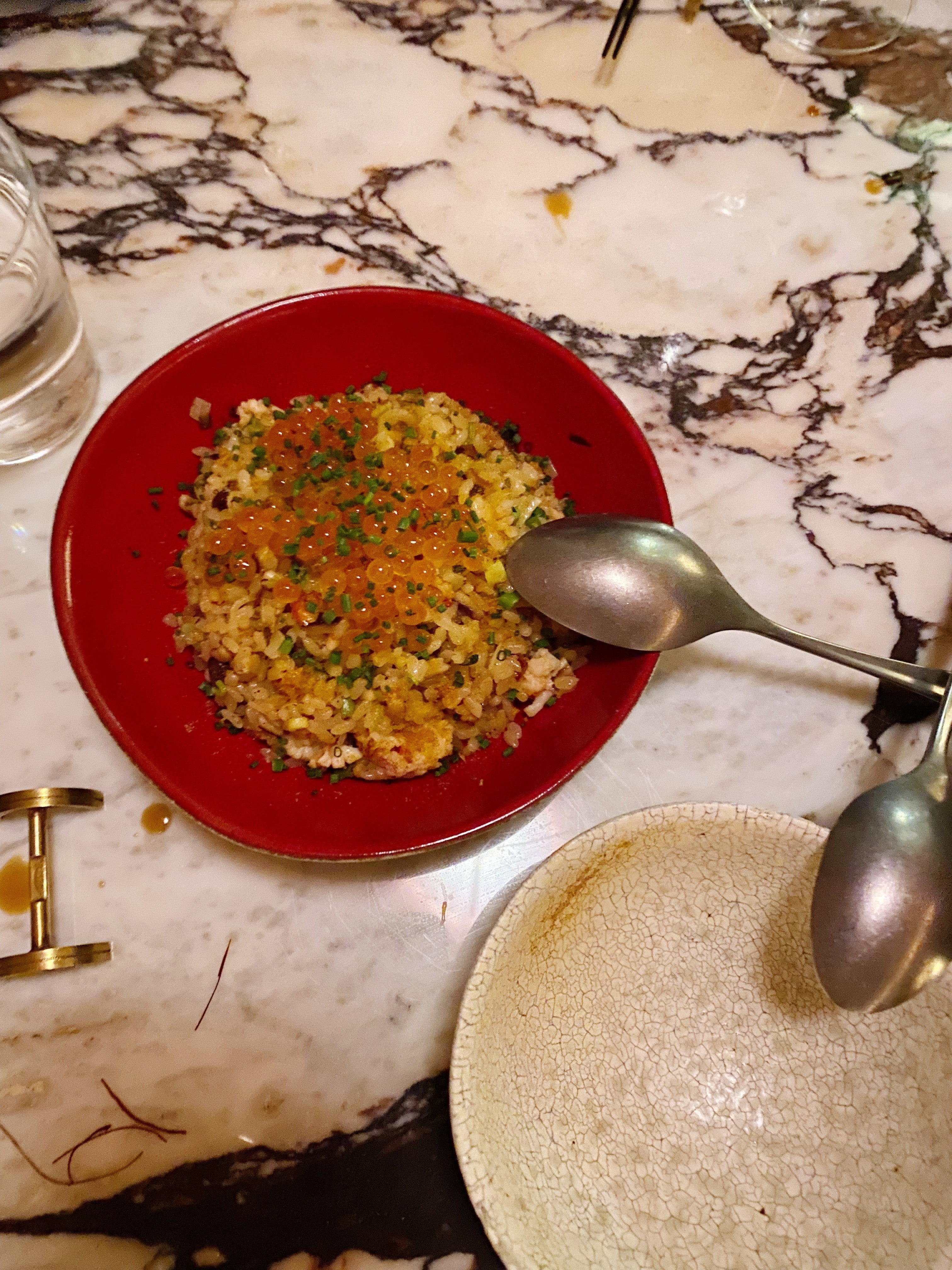 Golden and nutty lobster rice is flecked with juicy nuggets of the crustacean