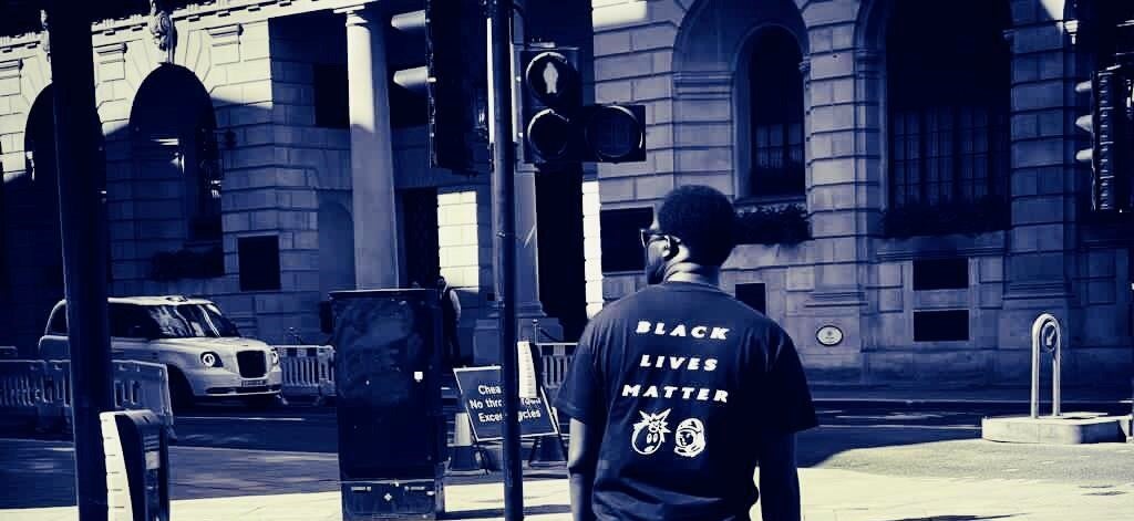 Kay Badu wearing a Black Lives Matter t-shirt.