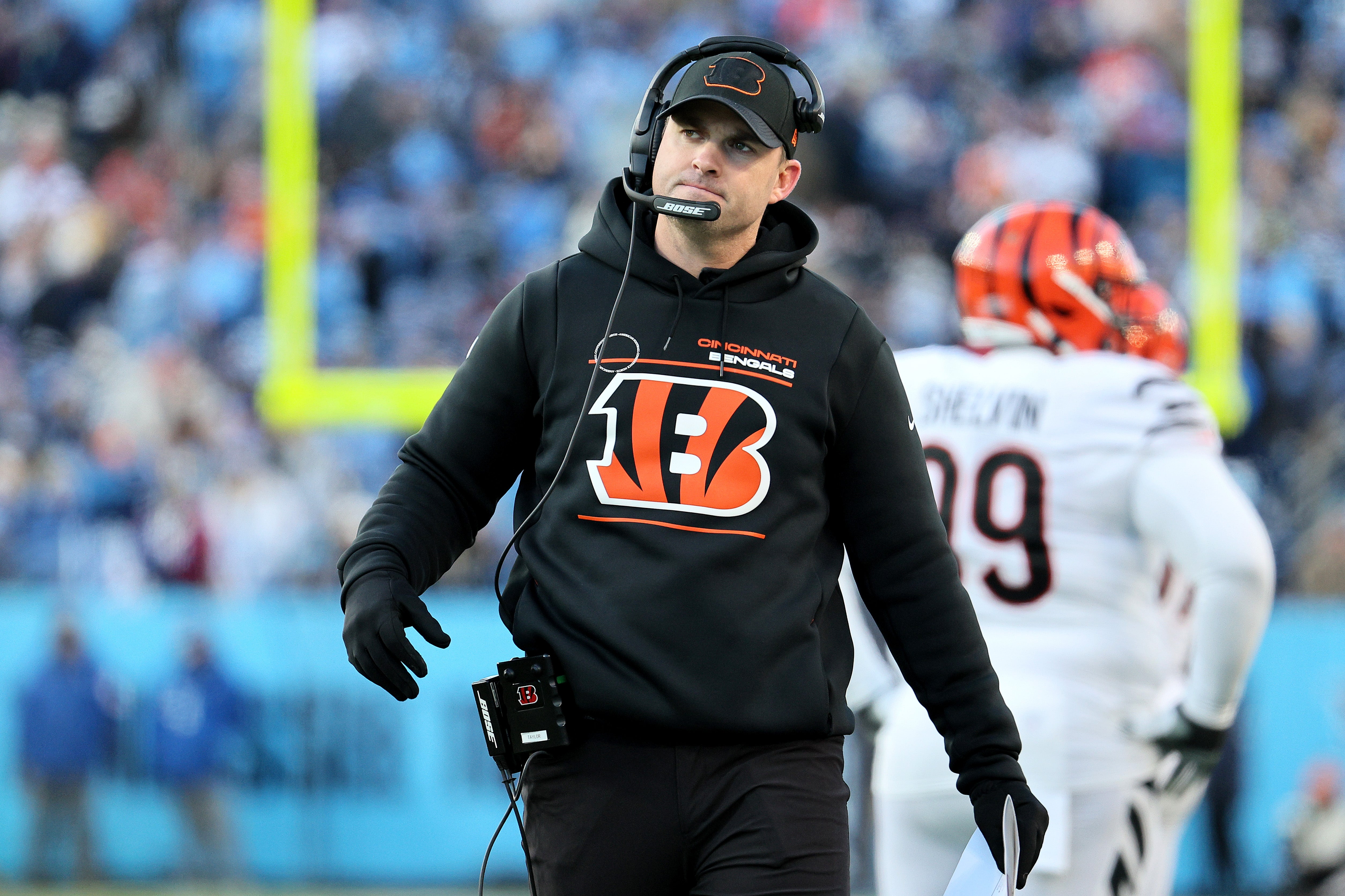 Head coach Zac Taylor of the Cincinnati Bengals looks on in the first half of the AFC Divisional Playoff game against the Tennessee Titans