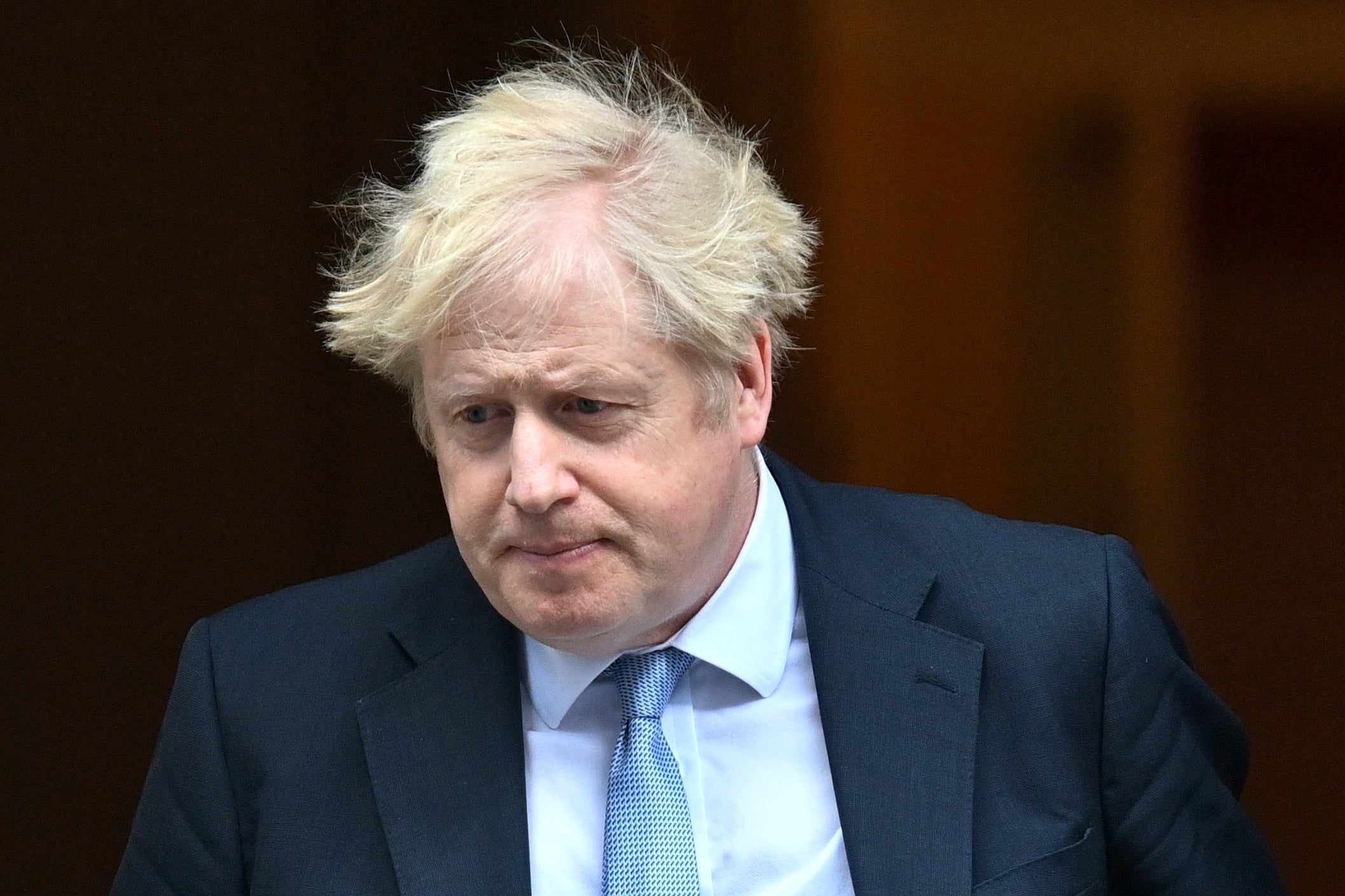 Prime Minister Boris Johnson leaves 10 Downing Street, London, to attend Prime Minister’s Questions at the Houses of Parliament (Victoria Jones/PA)