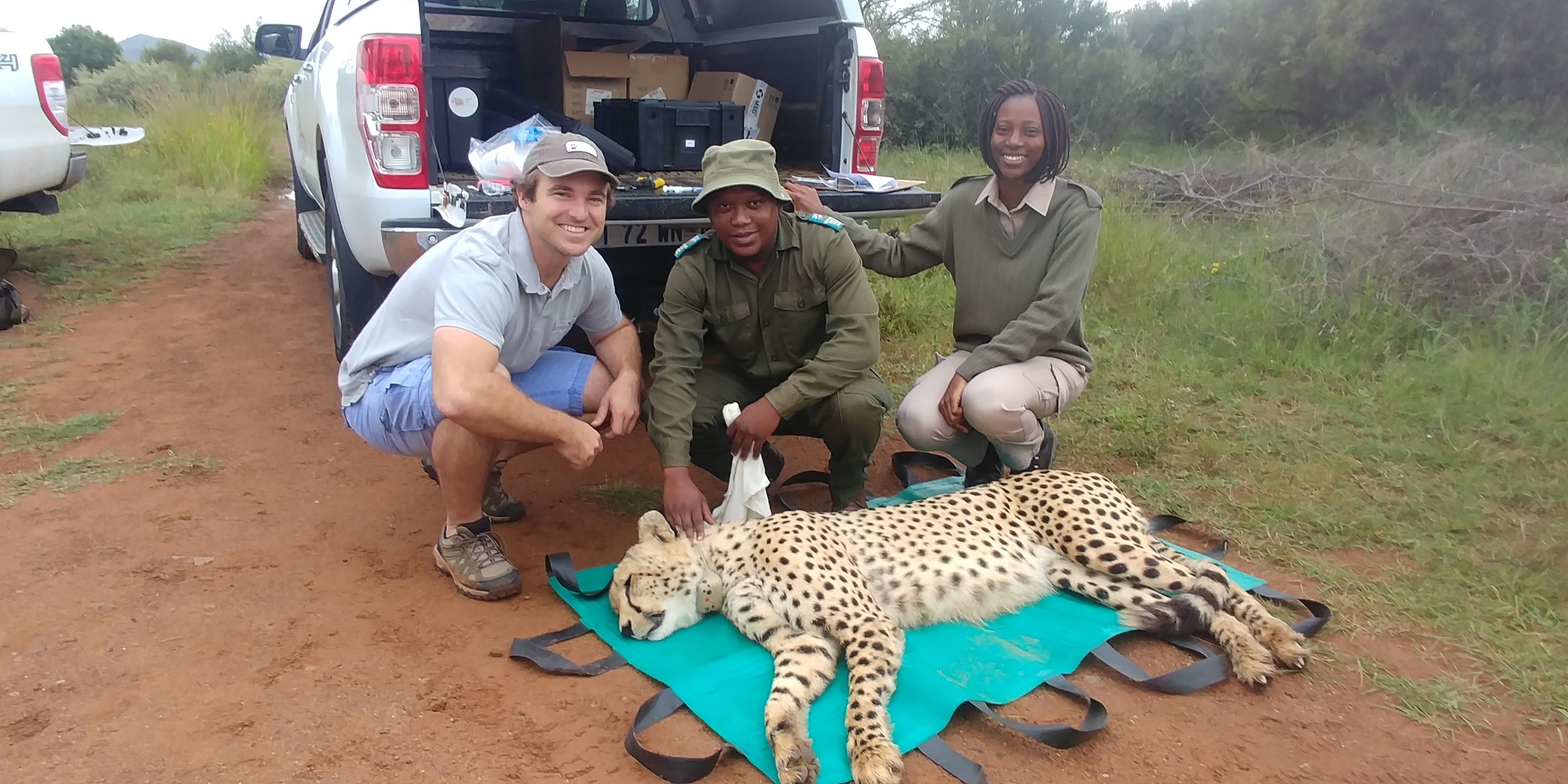 Vincent van der Merwe , left, with park rangers at the Pilanesburg National Park in South Africa