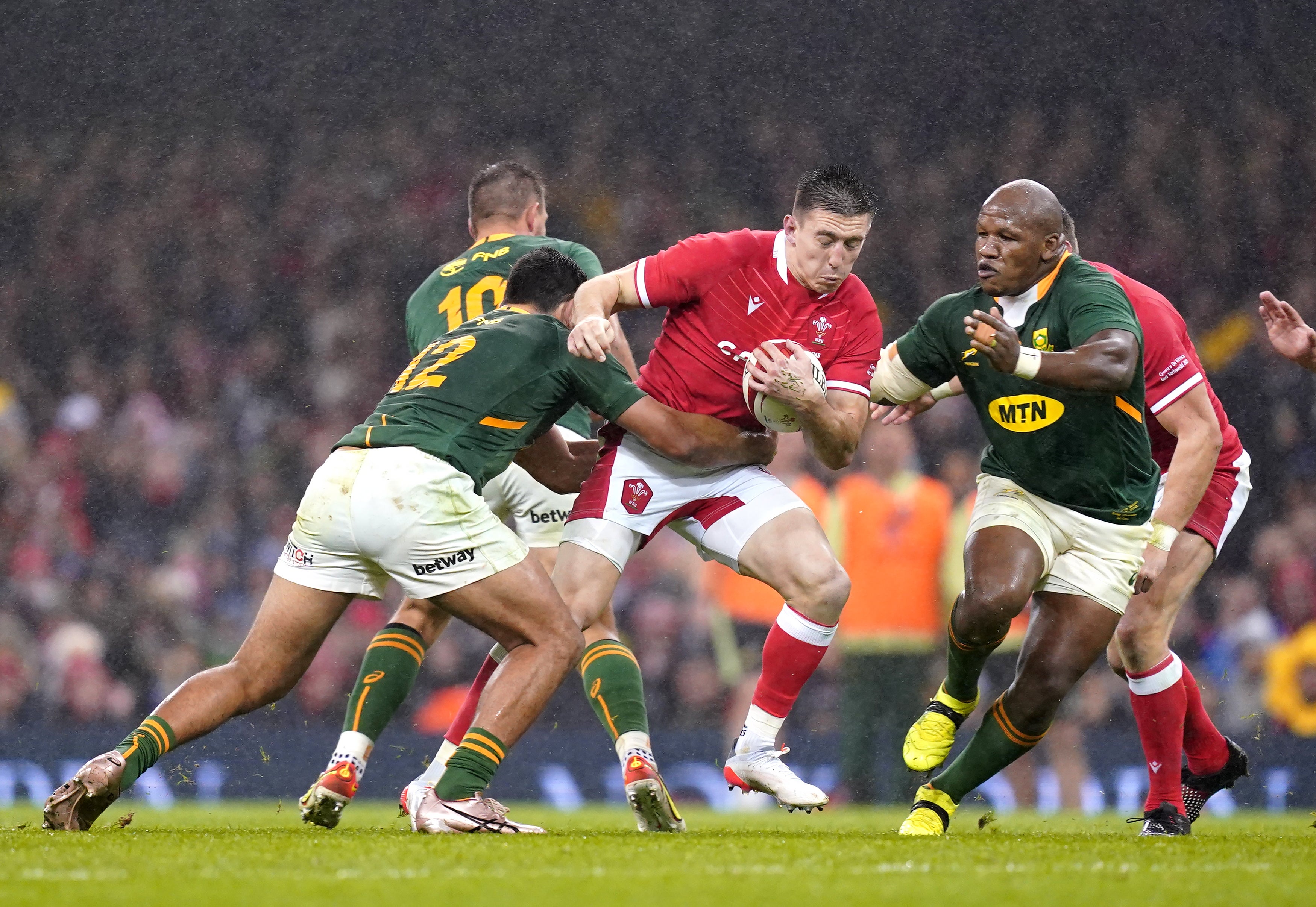 Josh Adams (centre) will miss Wales’ clash against Scotland due to injury (David Davies/PA)