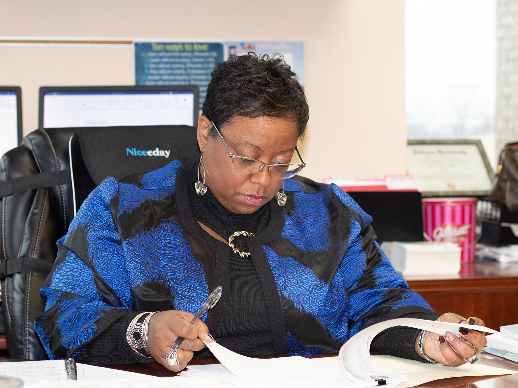 Alfarena McGinty at work in her office