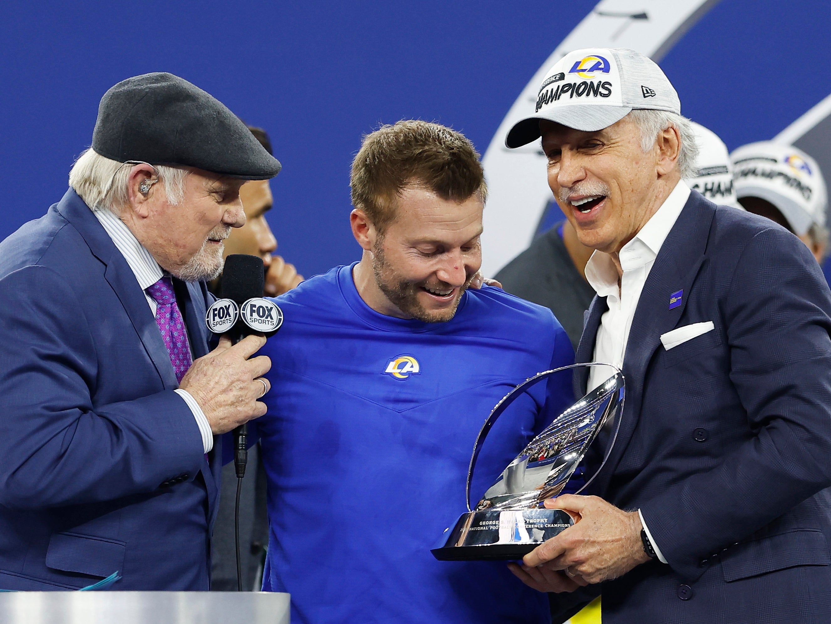 LA Rams owner Stan Kroenke (right) celebrates winning the NFC Championship game