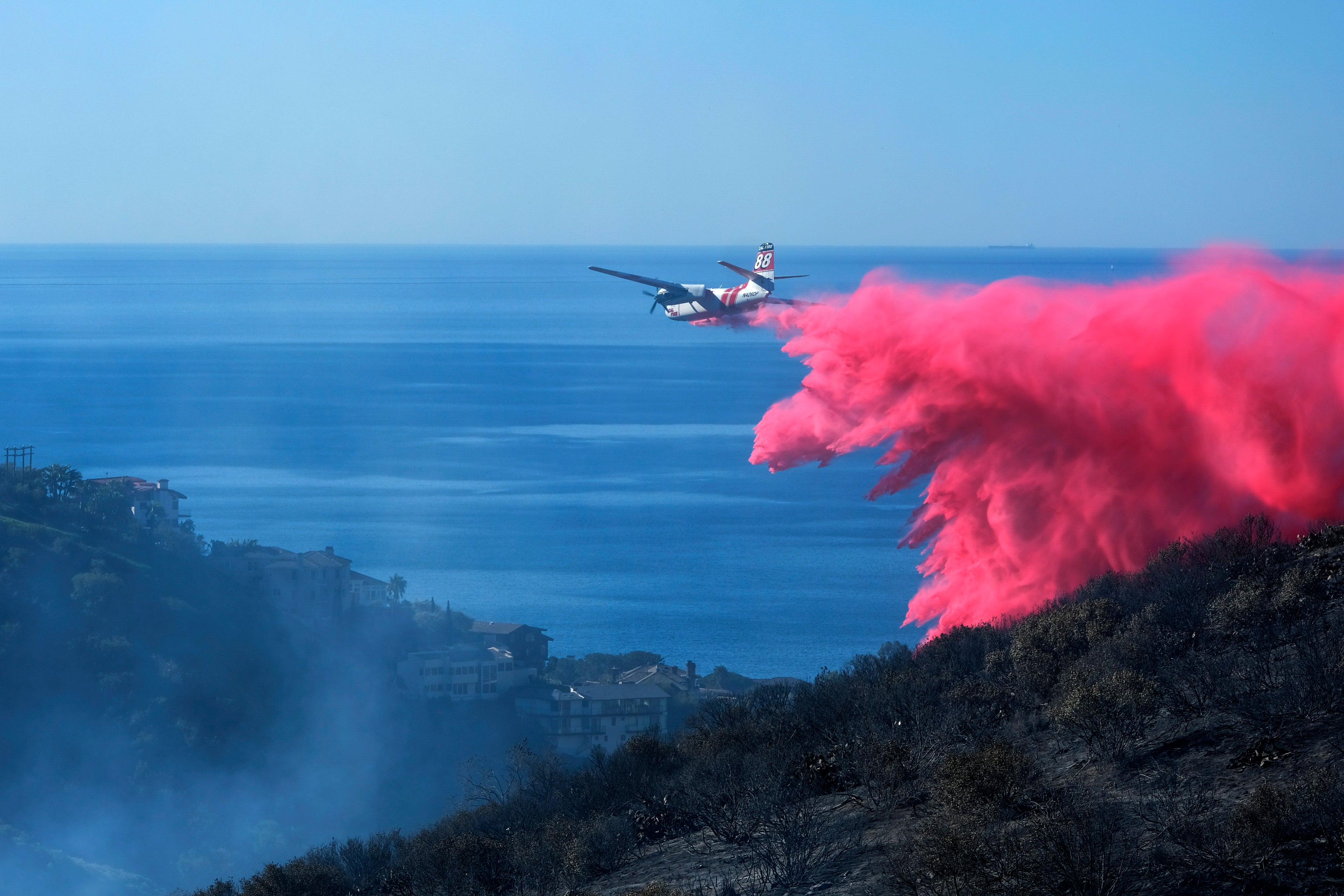 Firefighting aircraft were deployed over the blaze in Laguna Beach, California