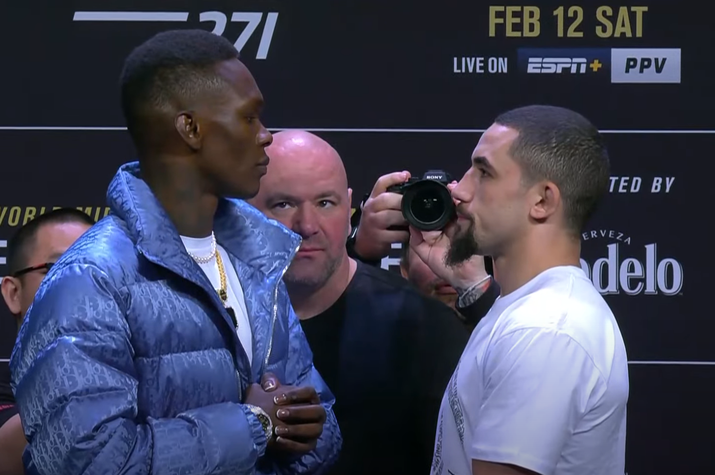 Israel Adesanya (left) goes face-to-face with Robert Whittaker