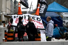 Third US-Canada port blocked by ‘freedom convoy’ as GM plant forced to close