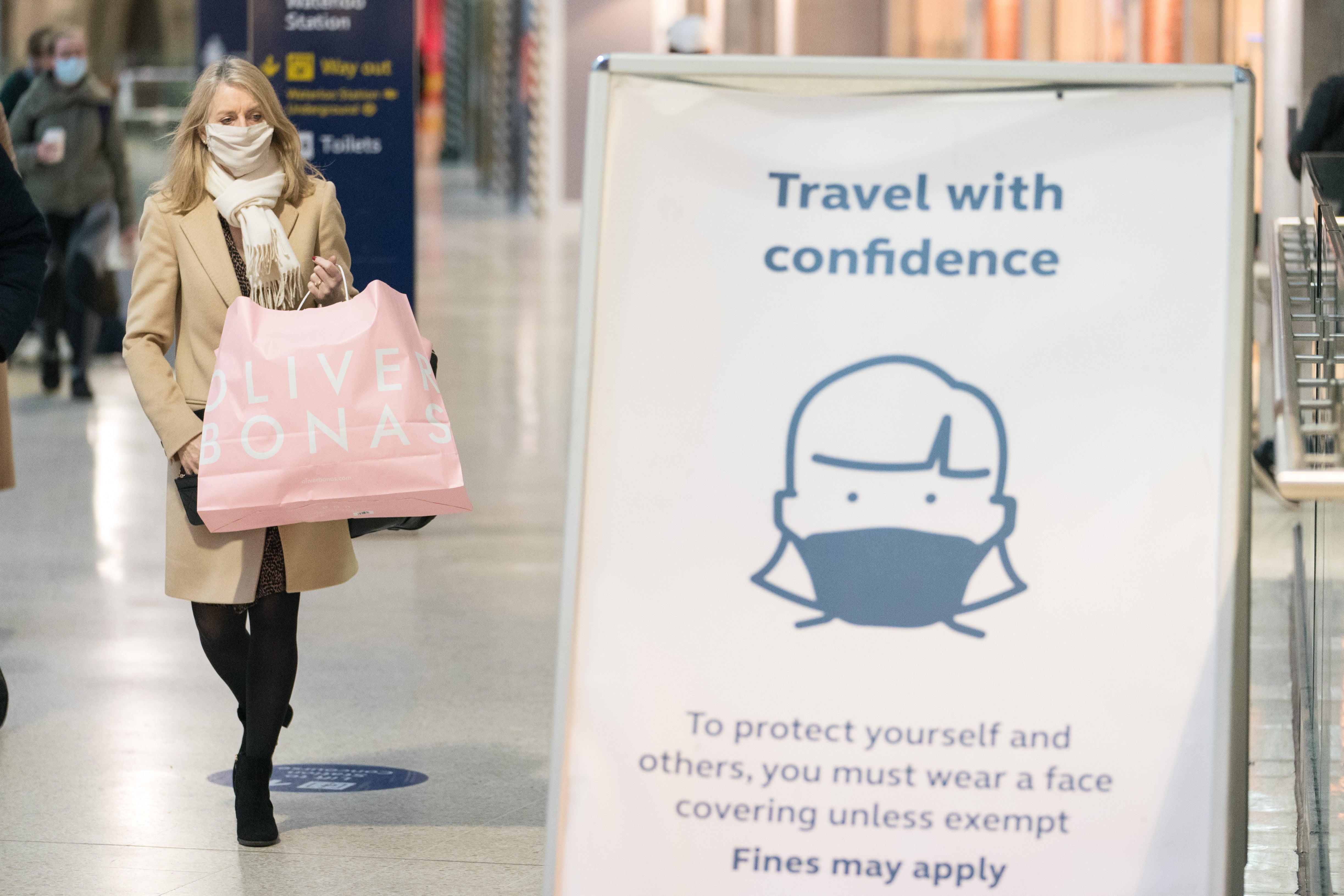 Commuters at Waterloo station, in London (Dominic Lipinski/PA)