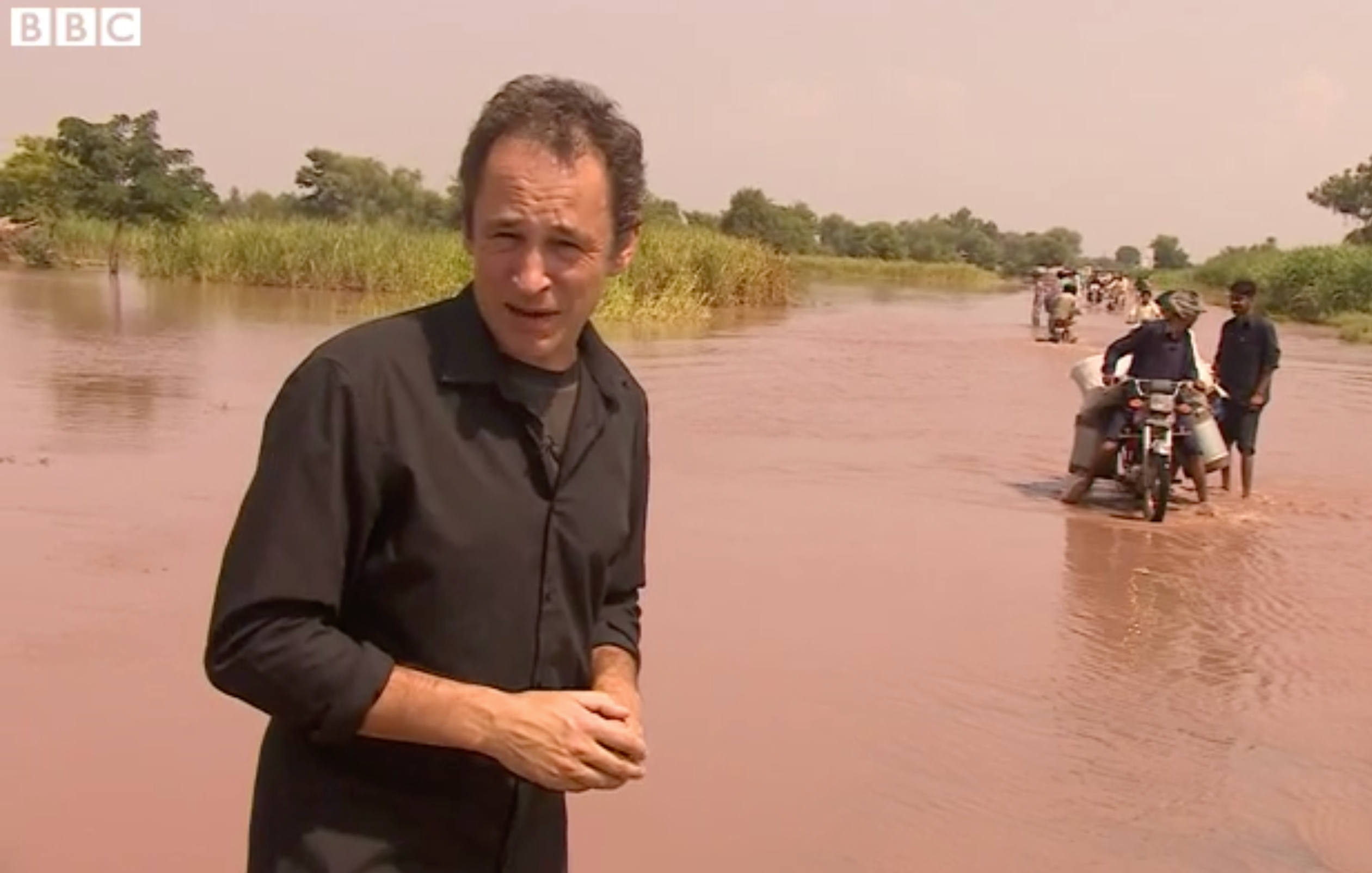 Andrew North in 2014 reporting from Pakistan in his role as BBC South Asia correspondent