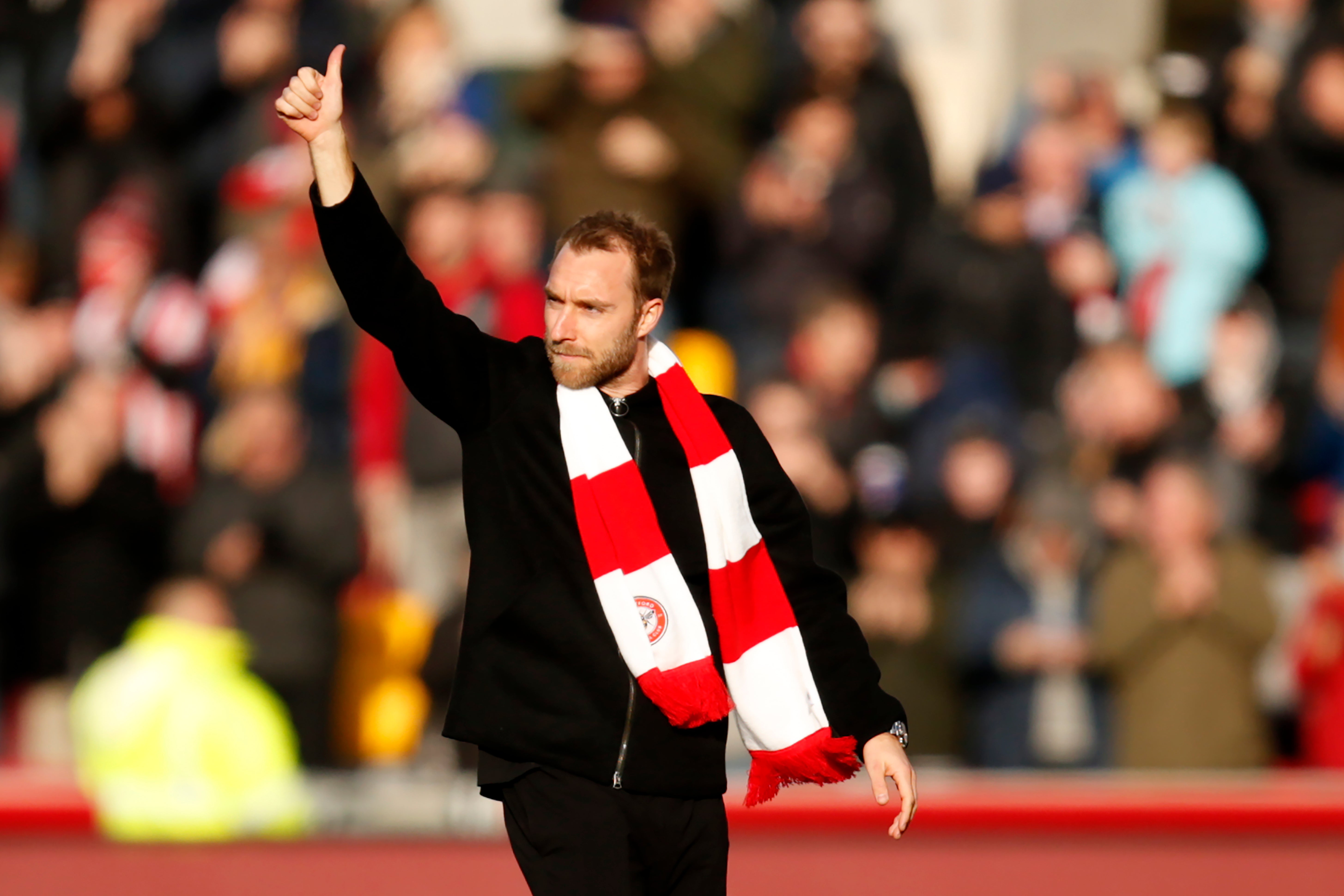 Christian Eriksen salutes the Brentford crowd