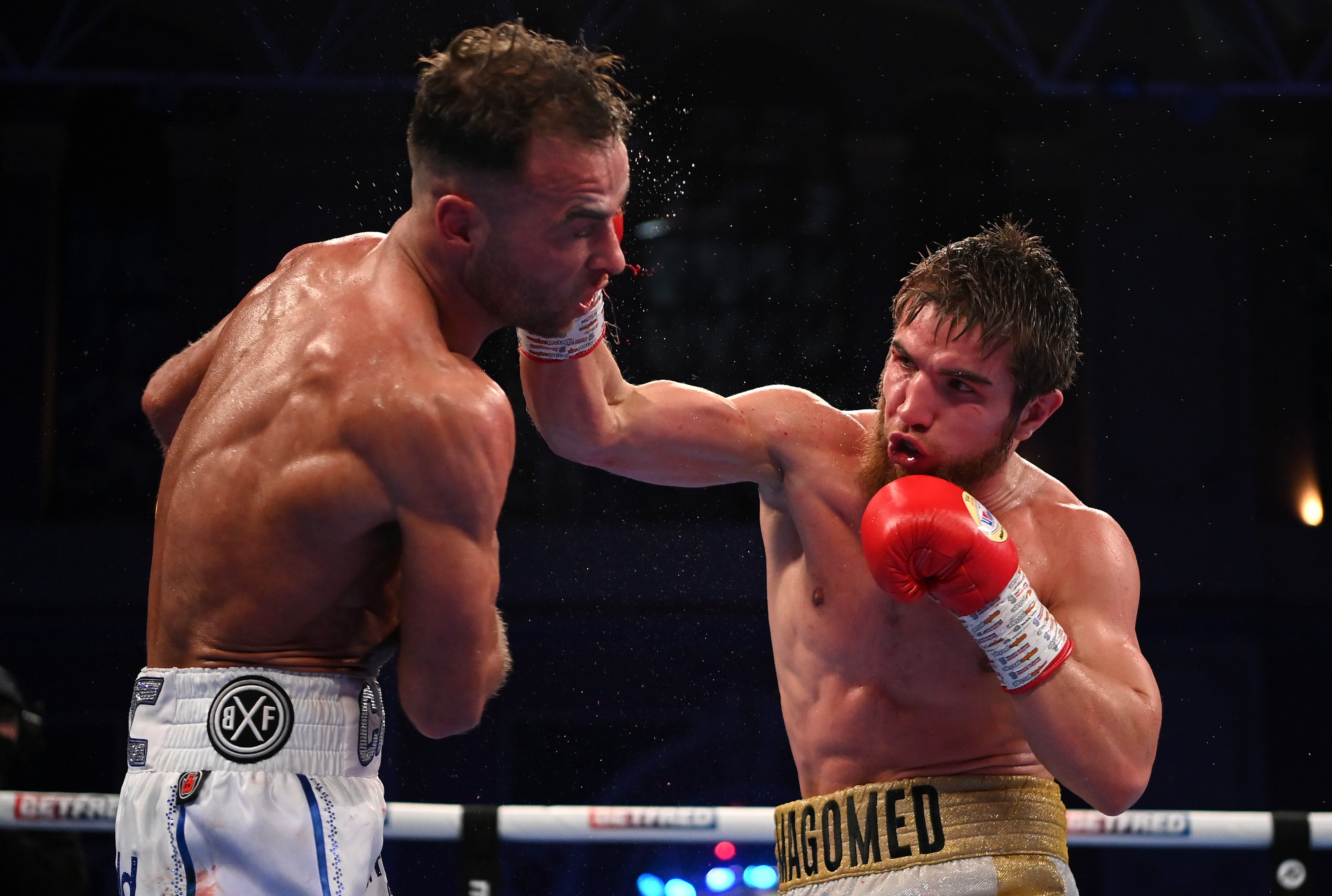 Felix Cash (left) beat Magomed Madiev despite being knocked down twice