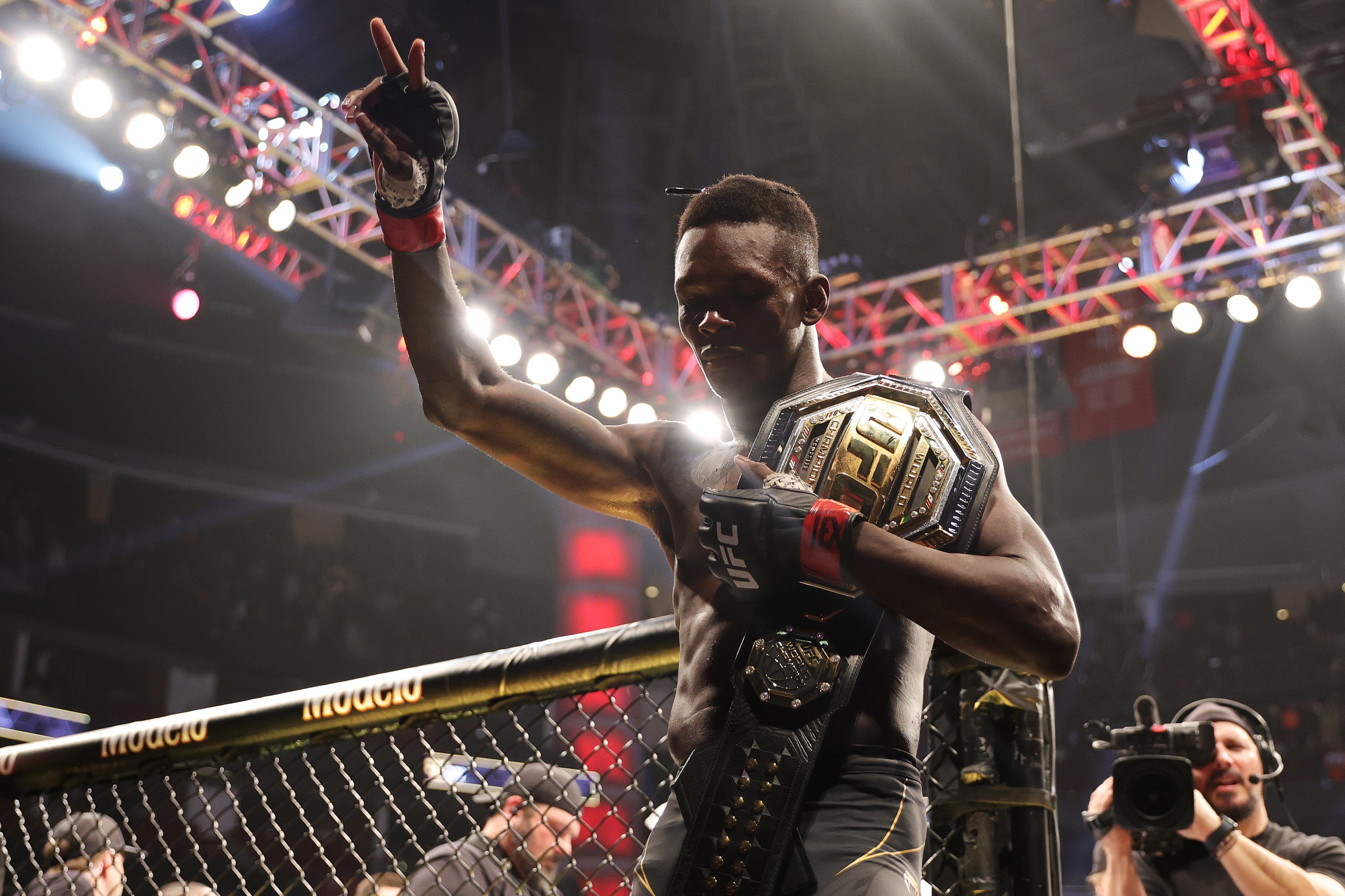 Adesanya leaves the Octagon after a fourth straight successful title defence