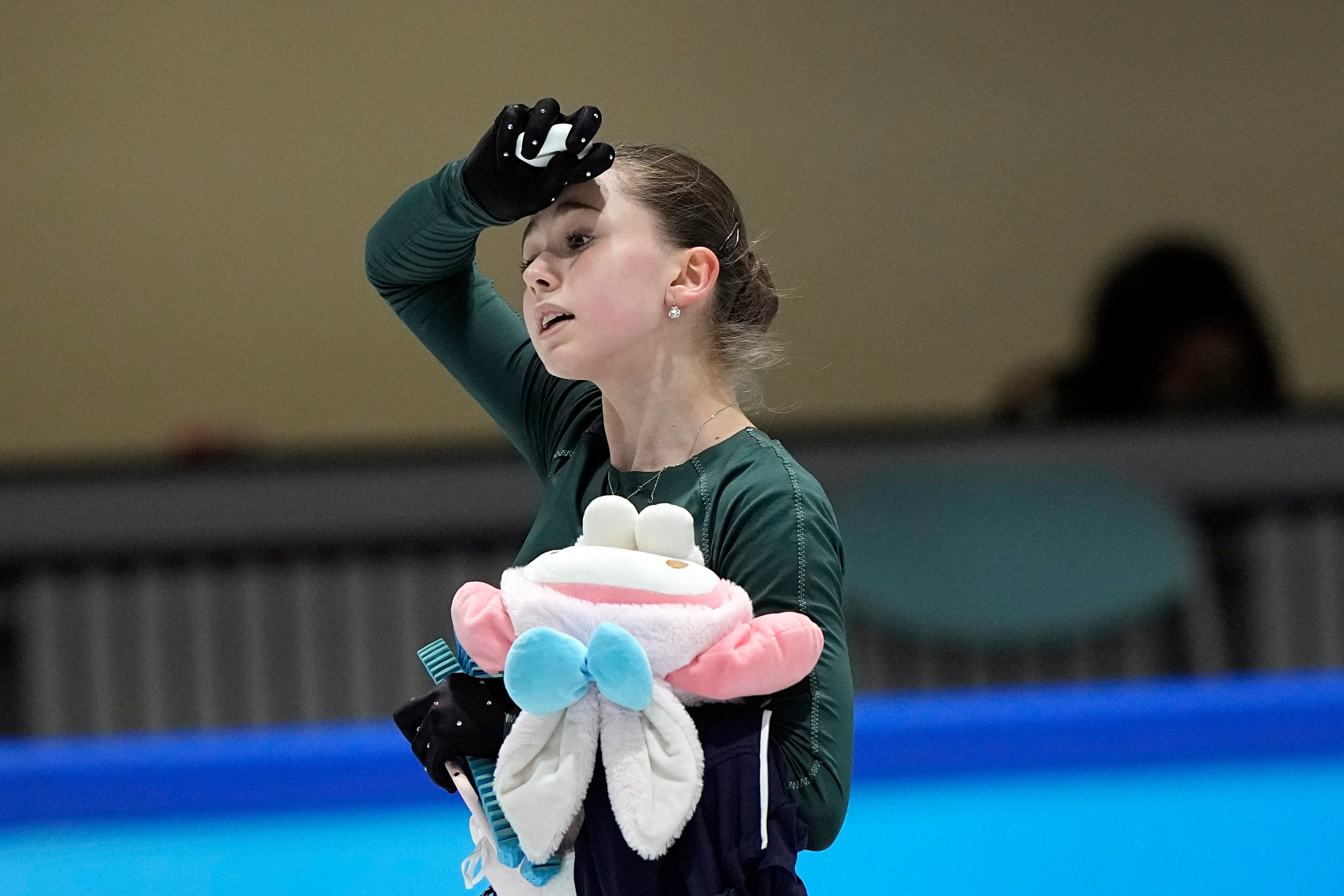 Kamila Valieva, of the ROC, leaves the ice after a training session