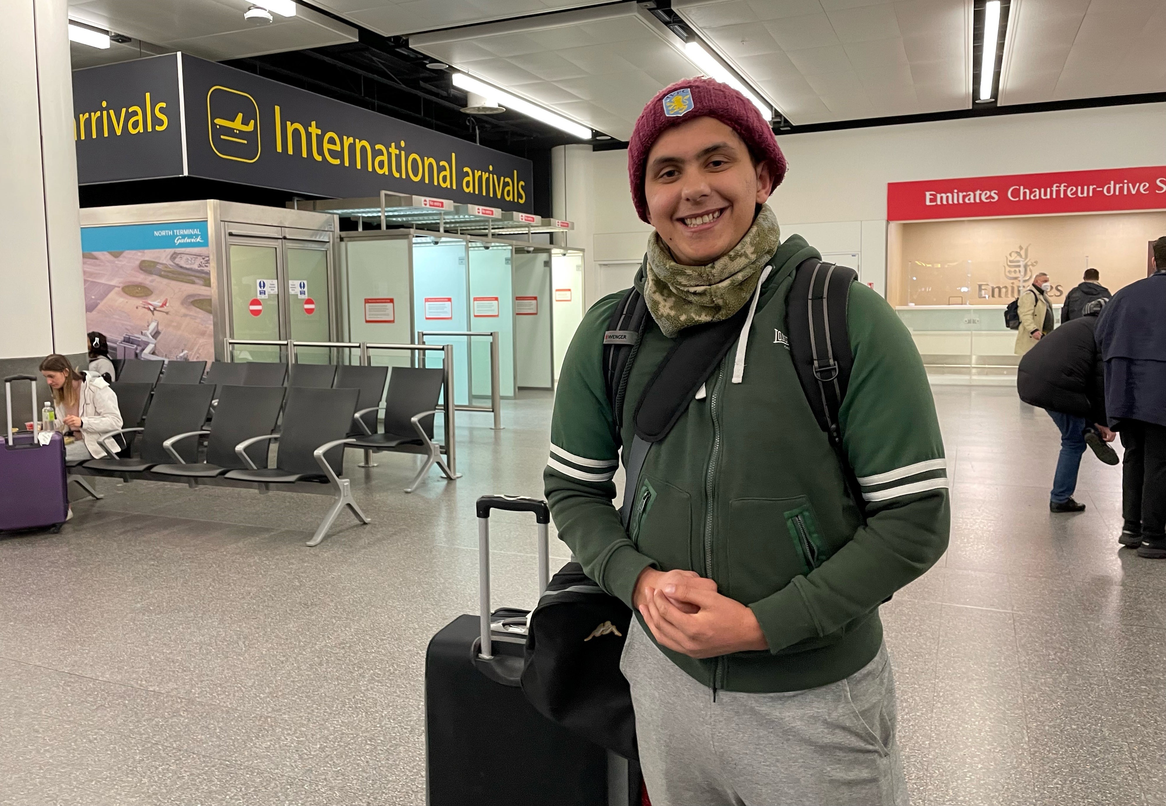 Haider Ali, 21, from Birmingham, arrives at Gatwick from Ukraine, where he studies at a medical university (Sophie Wingate/PA)