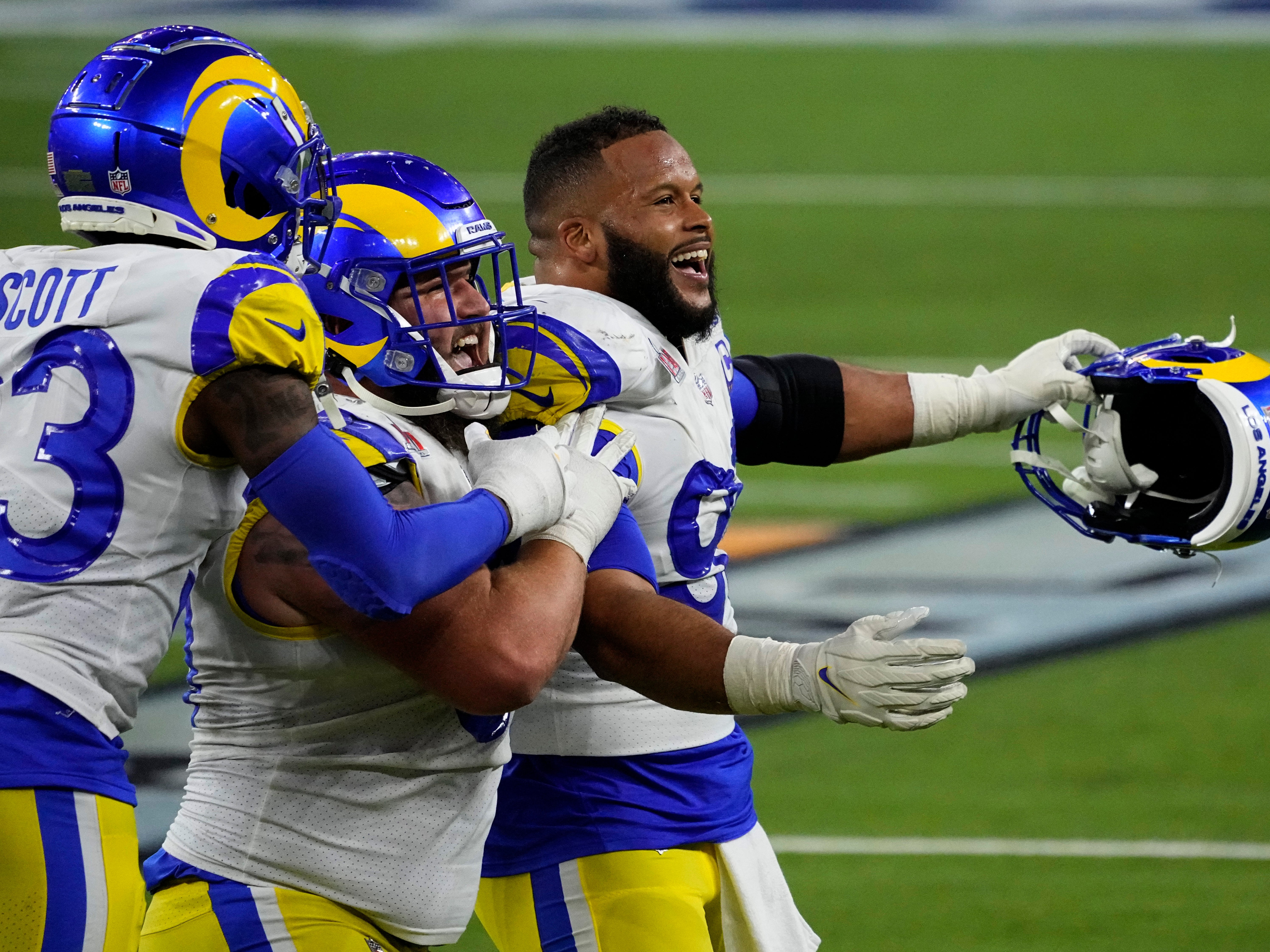 Los Angeles Rams defensive end Aaron Donald celebrates with teammates after winning Super Bowl 56