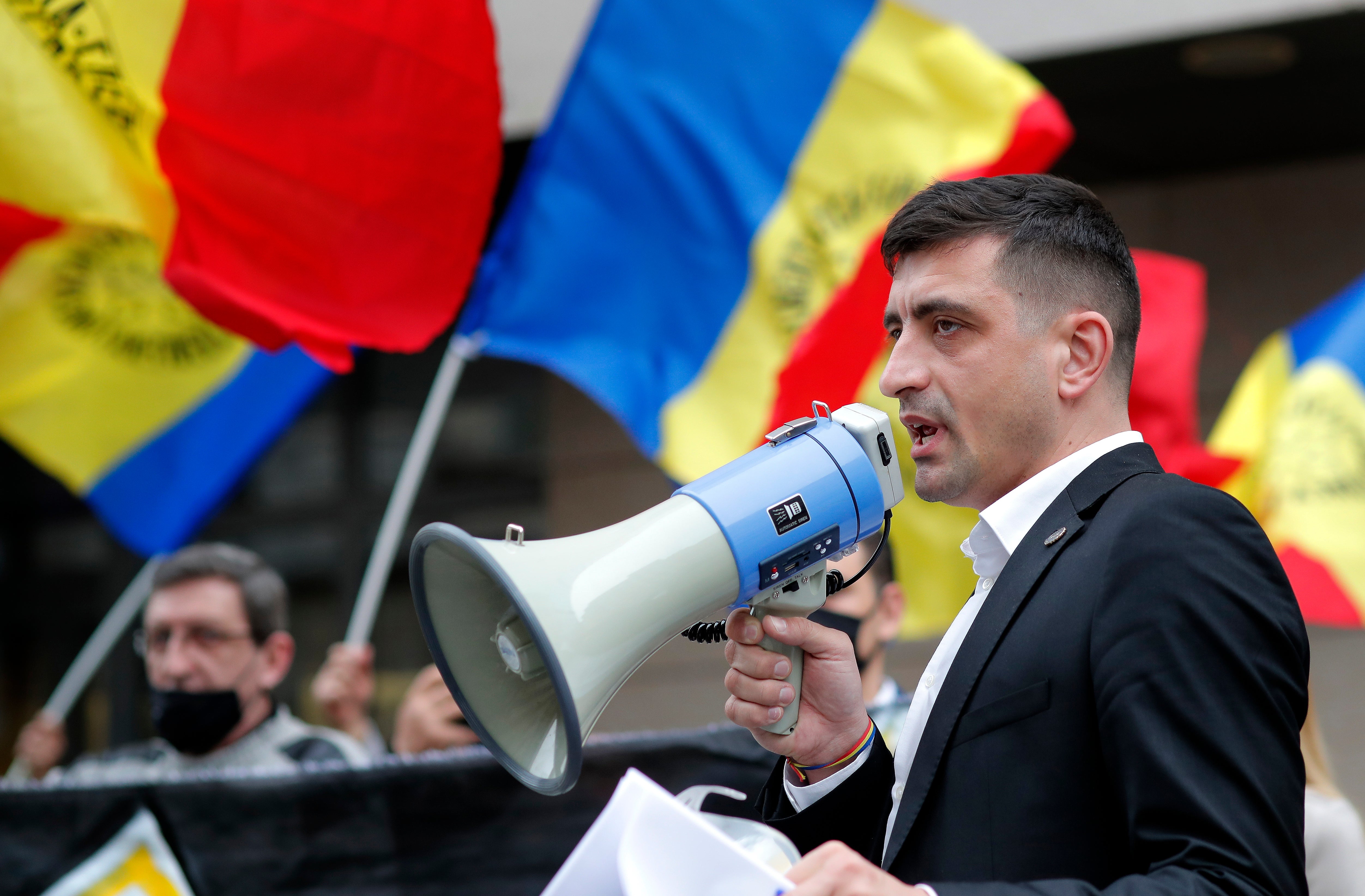 Romanian politician George Simion, leader of the Alliance for the Unity of Romanians (AUR), delivers a speech in Bucharest last year
