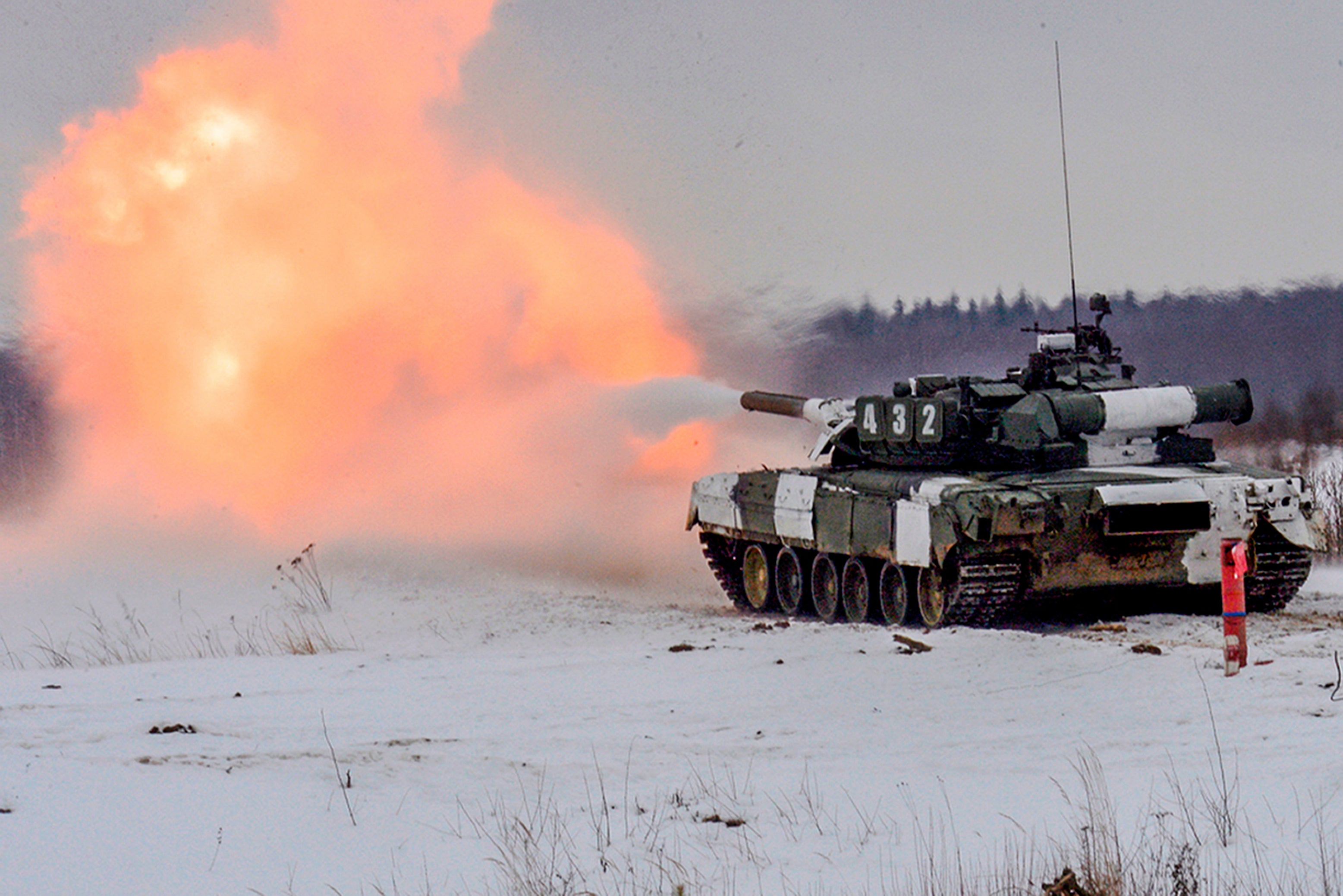 In this photo released by the Russian Defense Ministry Press Service on in Nizhny Novgorod, Russia, Saturday, Feb. 5, 2022, a tank takes part in a military exercise, in Russia